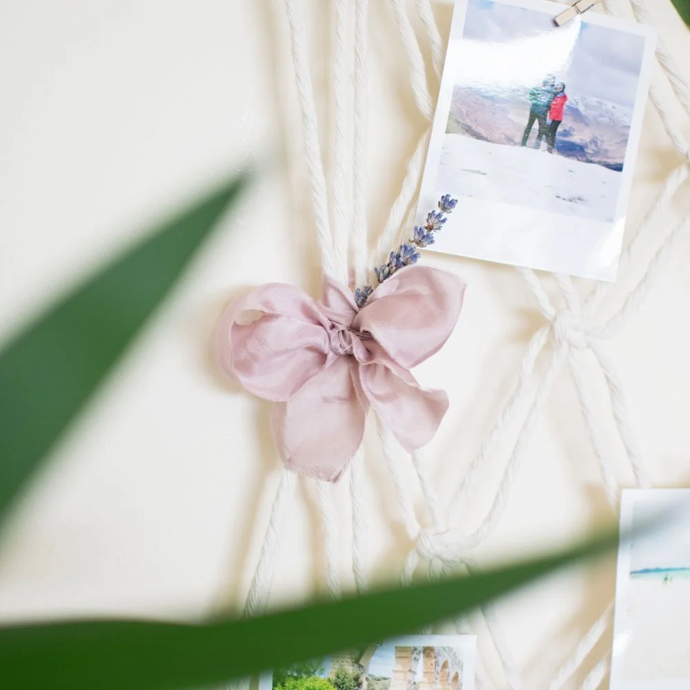 pink-ribbon-bow-on-macrame-wedding-display.jpg