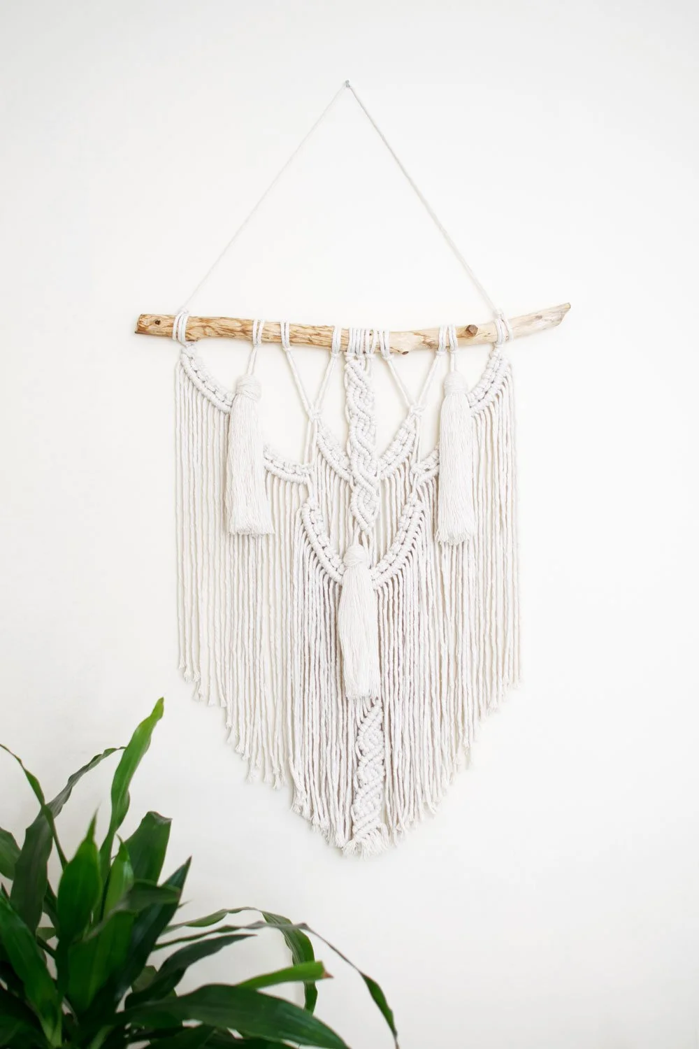 tassel macrame wall hanigng on driftwood