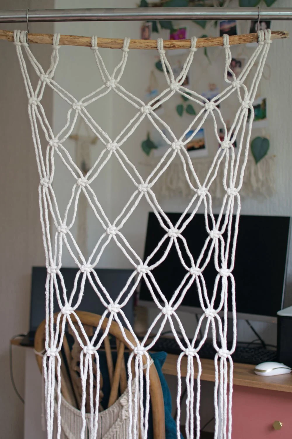 alternating macrame square knot pattern on driftwood