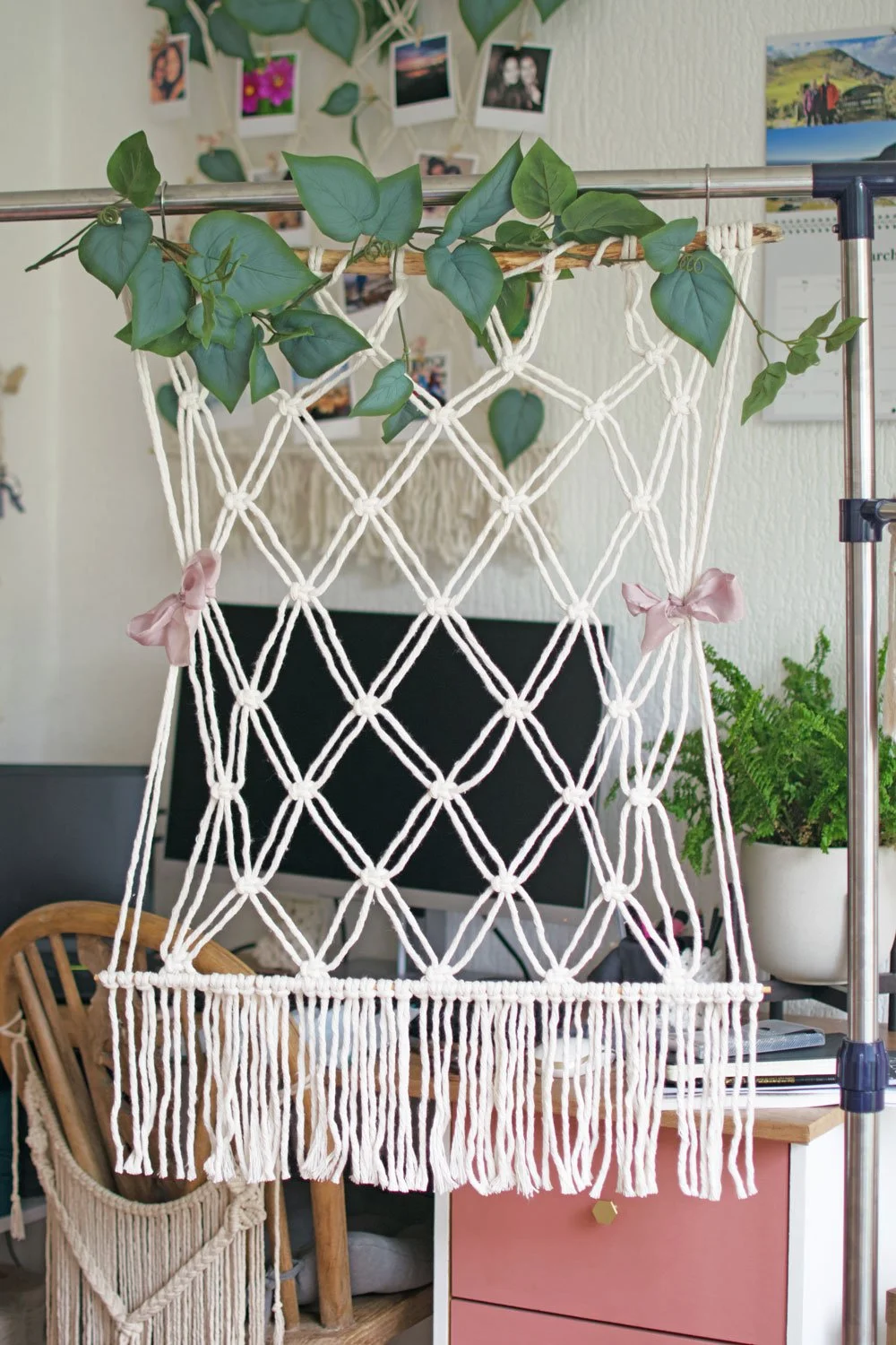 macrame photo display with faux greenary