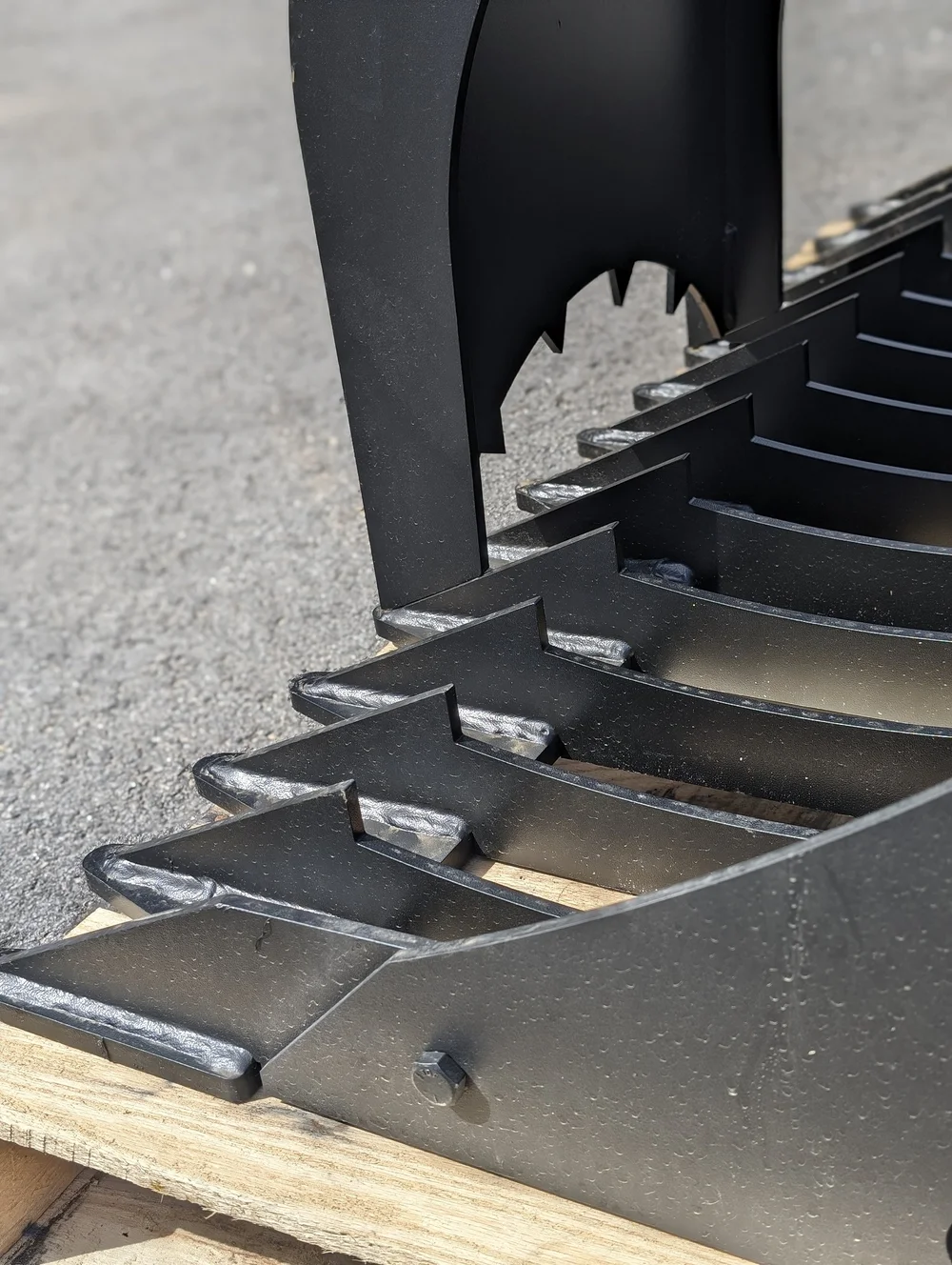 Jenkins Rock Buckets — NH Skid Steer Attachments