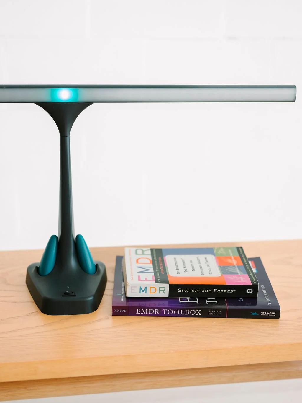 EMDR lightbar and books about EMDR