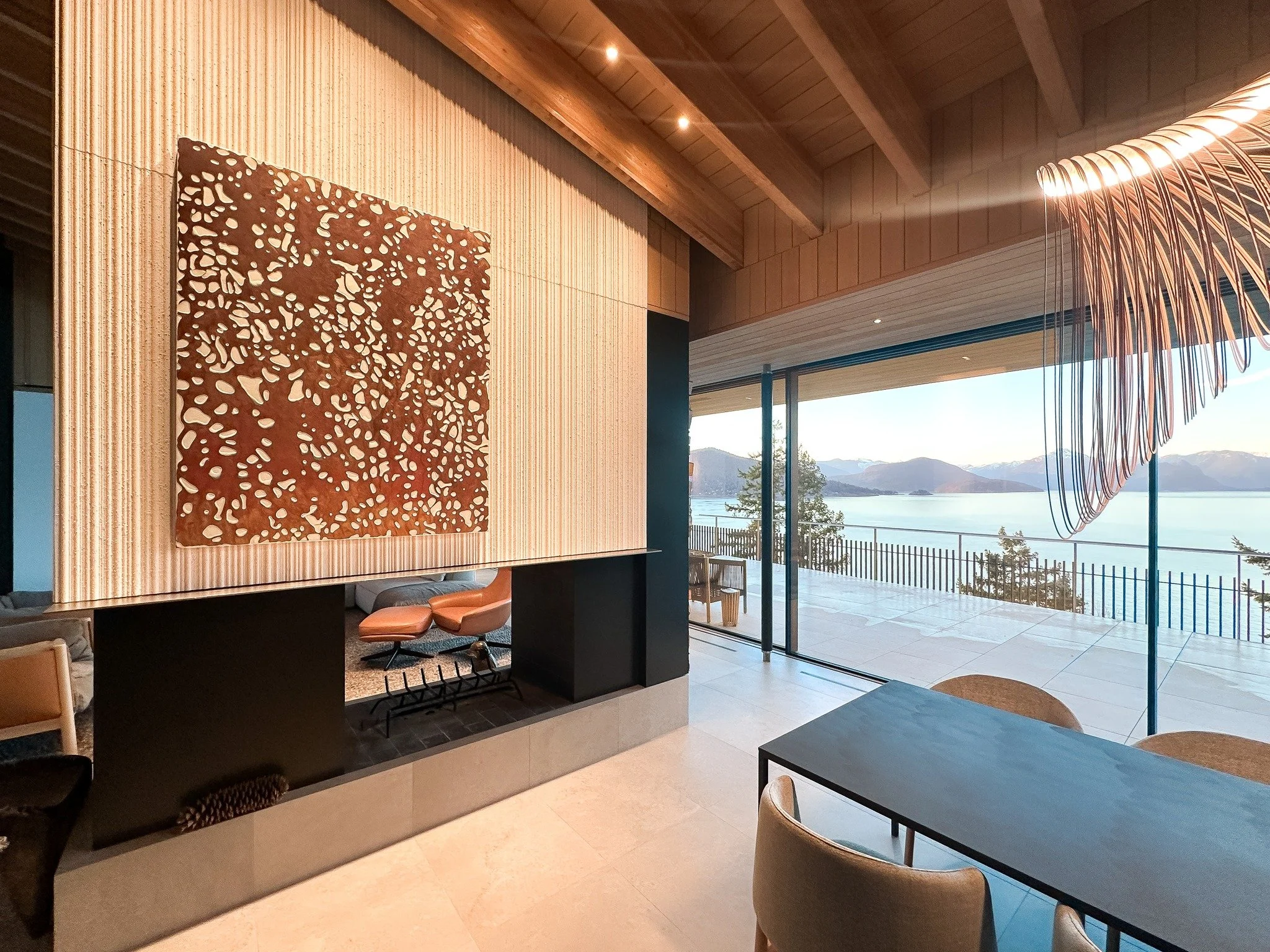 Art doesn't have to be perfectly in the middle of the wall every time. Placing something off centre can help to enhance your home, so think outside the box! 

#ArtInstallation #ArtHandling #ArtInInteriors #LuxuryInteriors #HomeGallery #FireplaceDesig