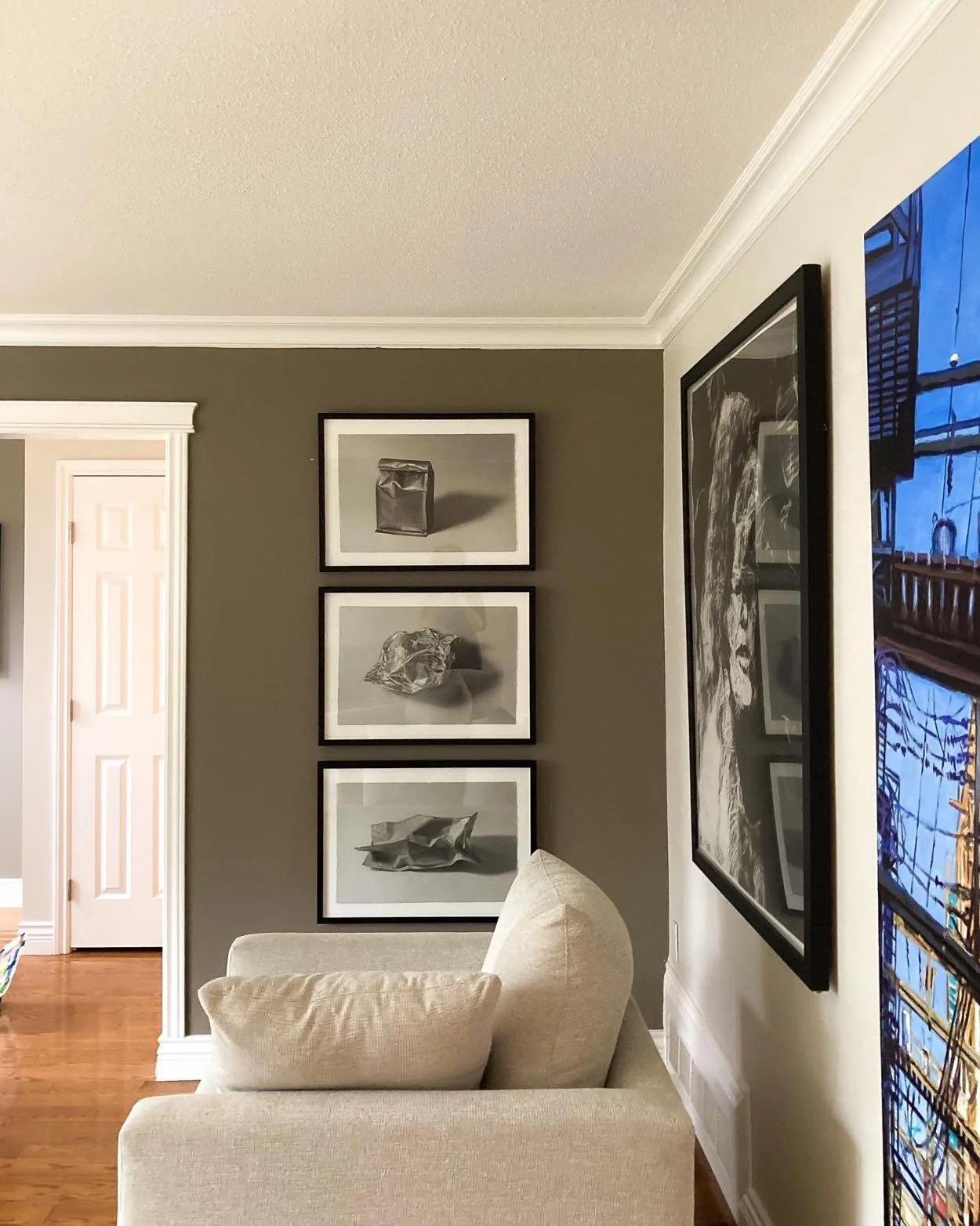 Sometimes the quietest works hold the most attention.

A strong installation isn&rsquo;t always about filling a wall&mdash;it&rsquo;s about creating rhythm, balance, and space for the eye to pause.

Stacking these monochromatic works vertically draws