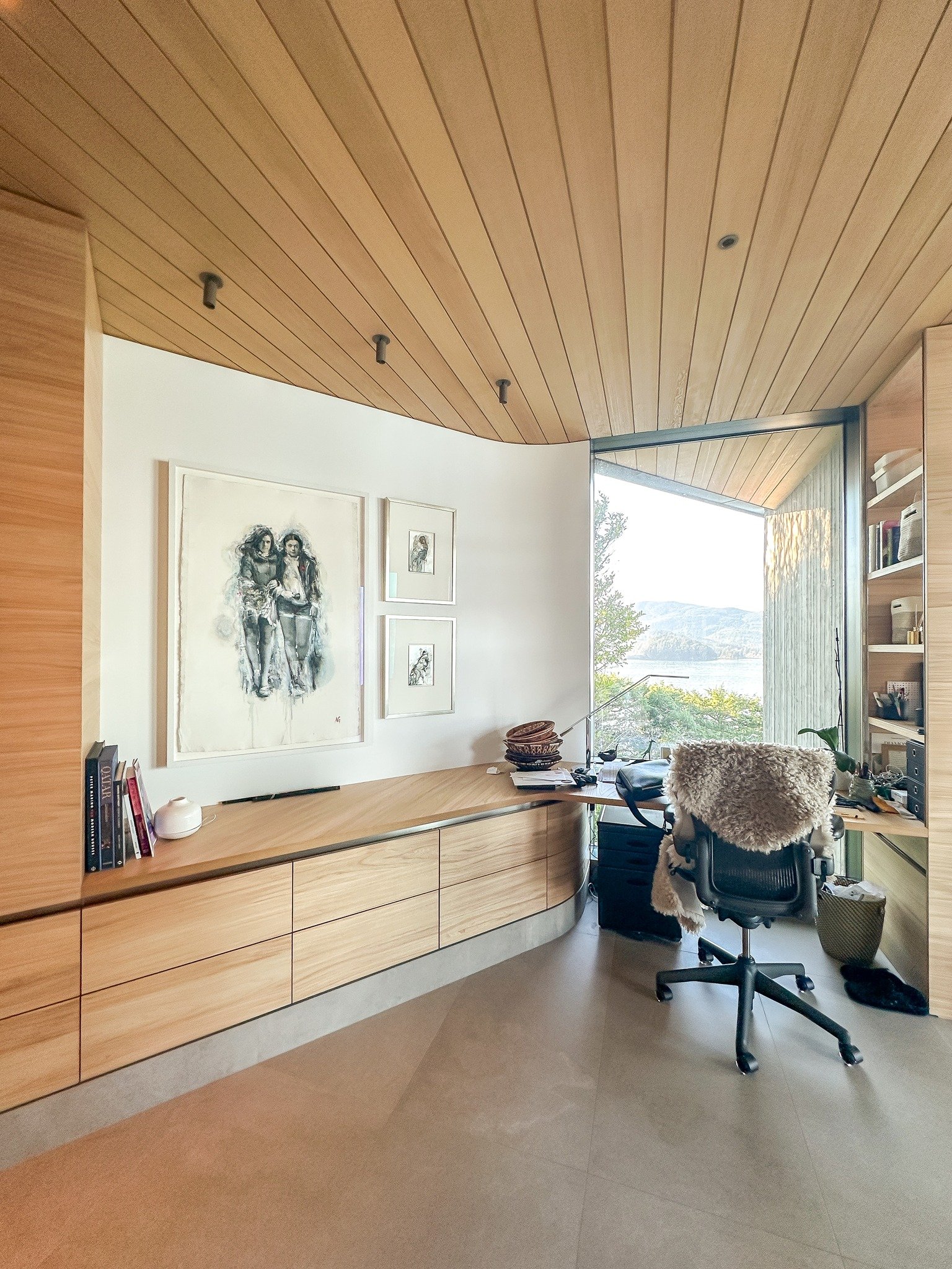 Now this is an office, love the placement on this install. Not everything has to be matchy match or line up - sometimes it actually looks better with a bit more tension, makes it more interesting for the eye.