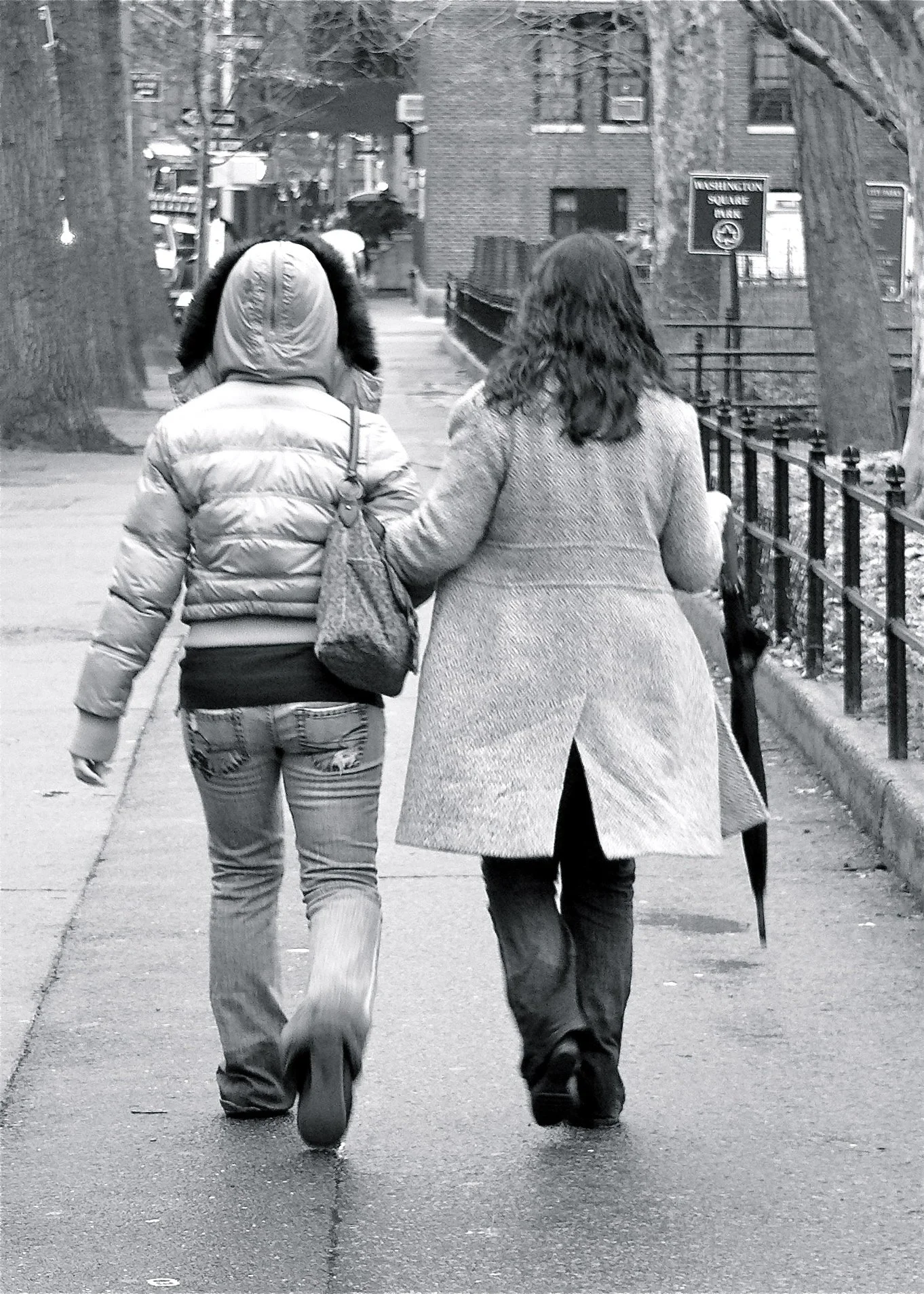This image was taken almost 20 years ago. I just loved watching these two walk arm in arm just outside Washington Square Park.  They also happen to be my two daughters