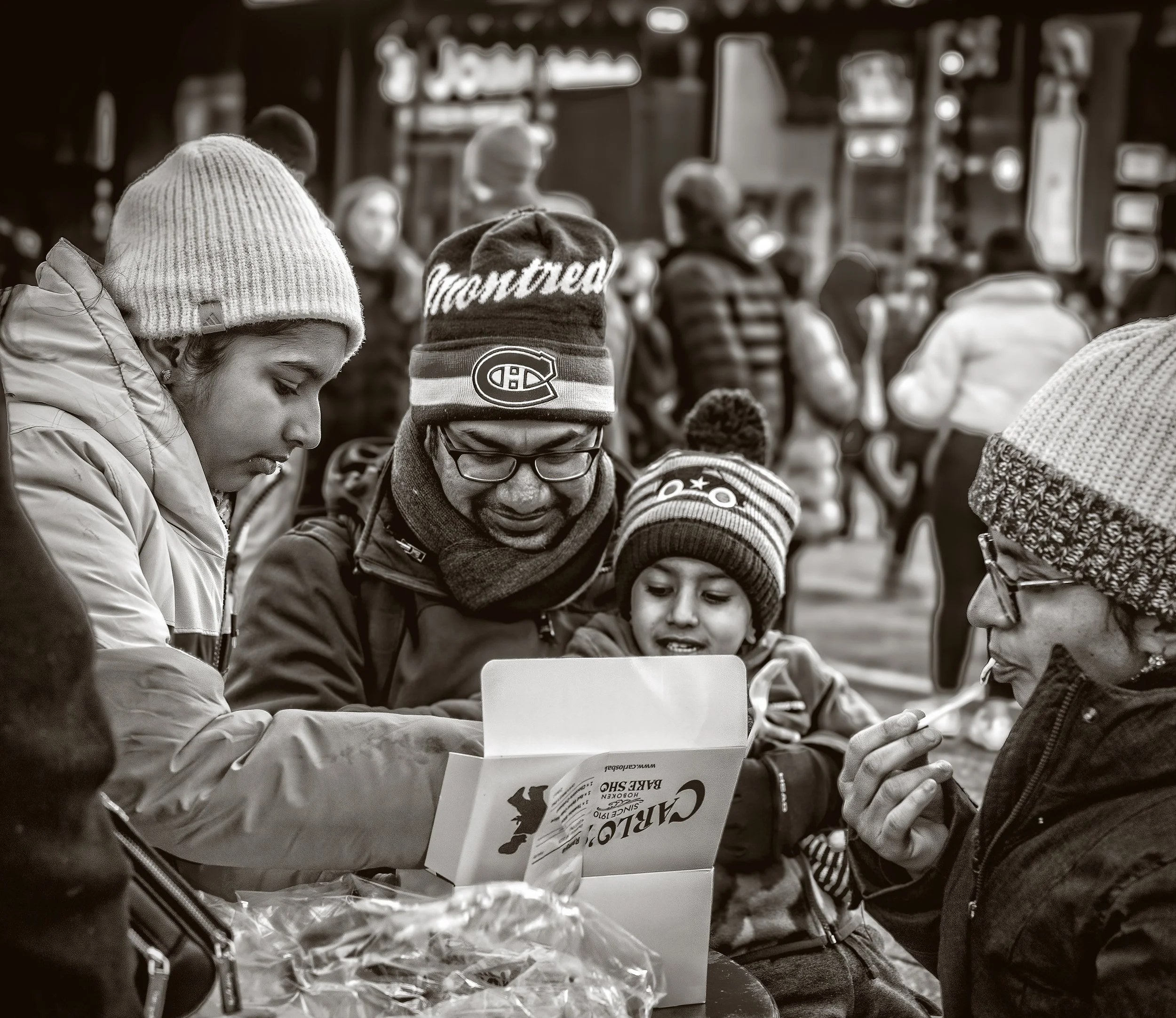 Look at the joy on this family's face as they are about to dig in to their treats