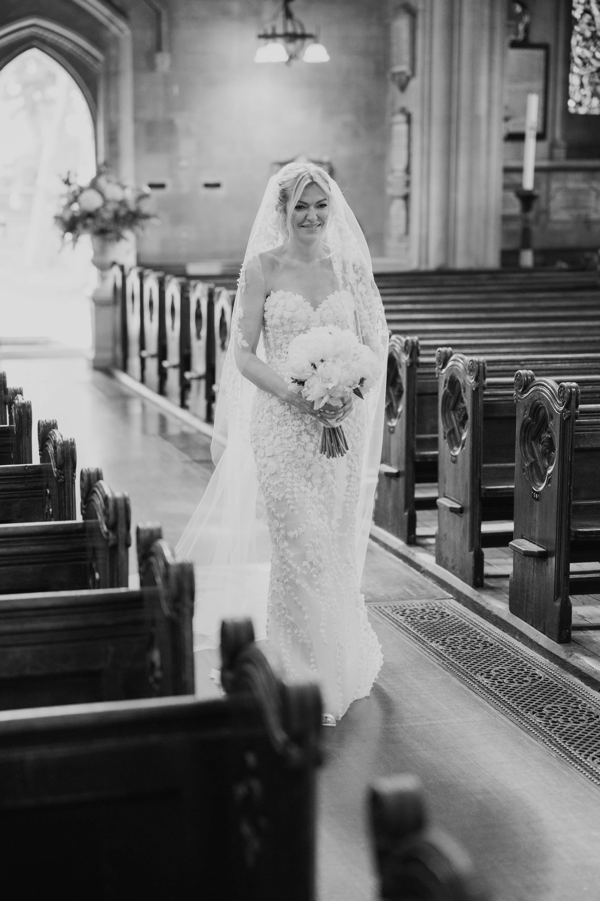 bride-walking-down-aisle-kensington-church-ceremony.jpg