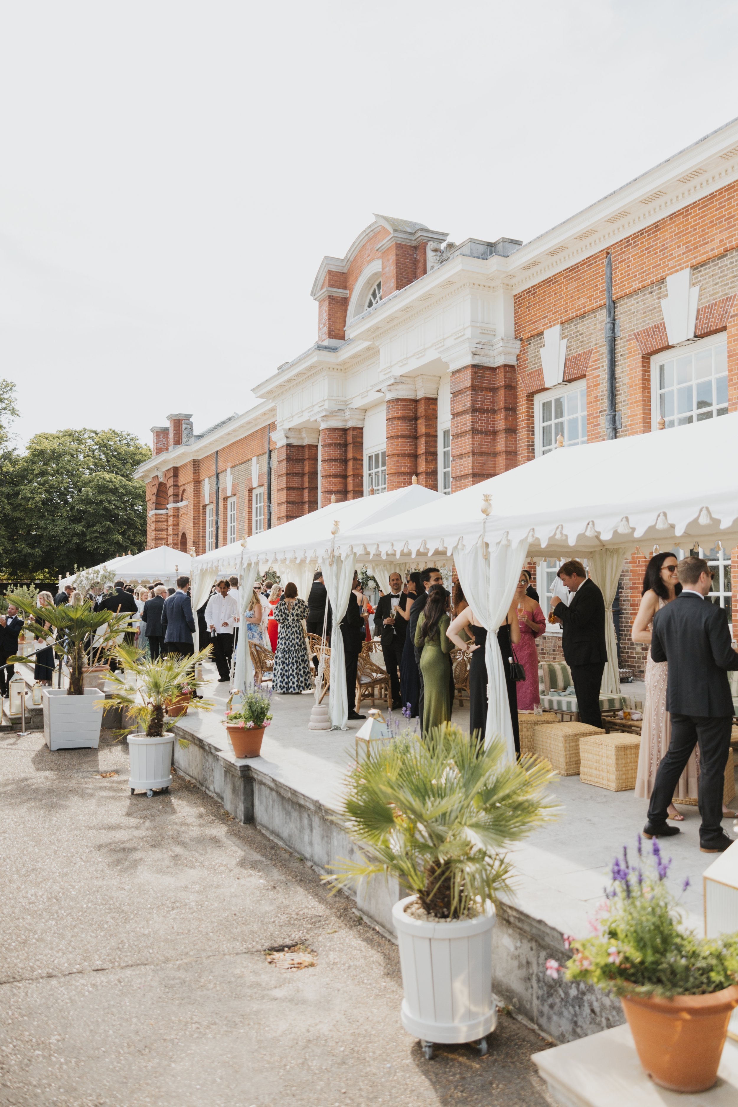guests-outside-kensington-palace-orangery-wedding.jpg