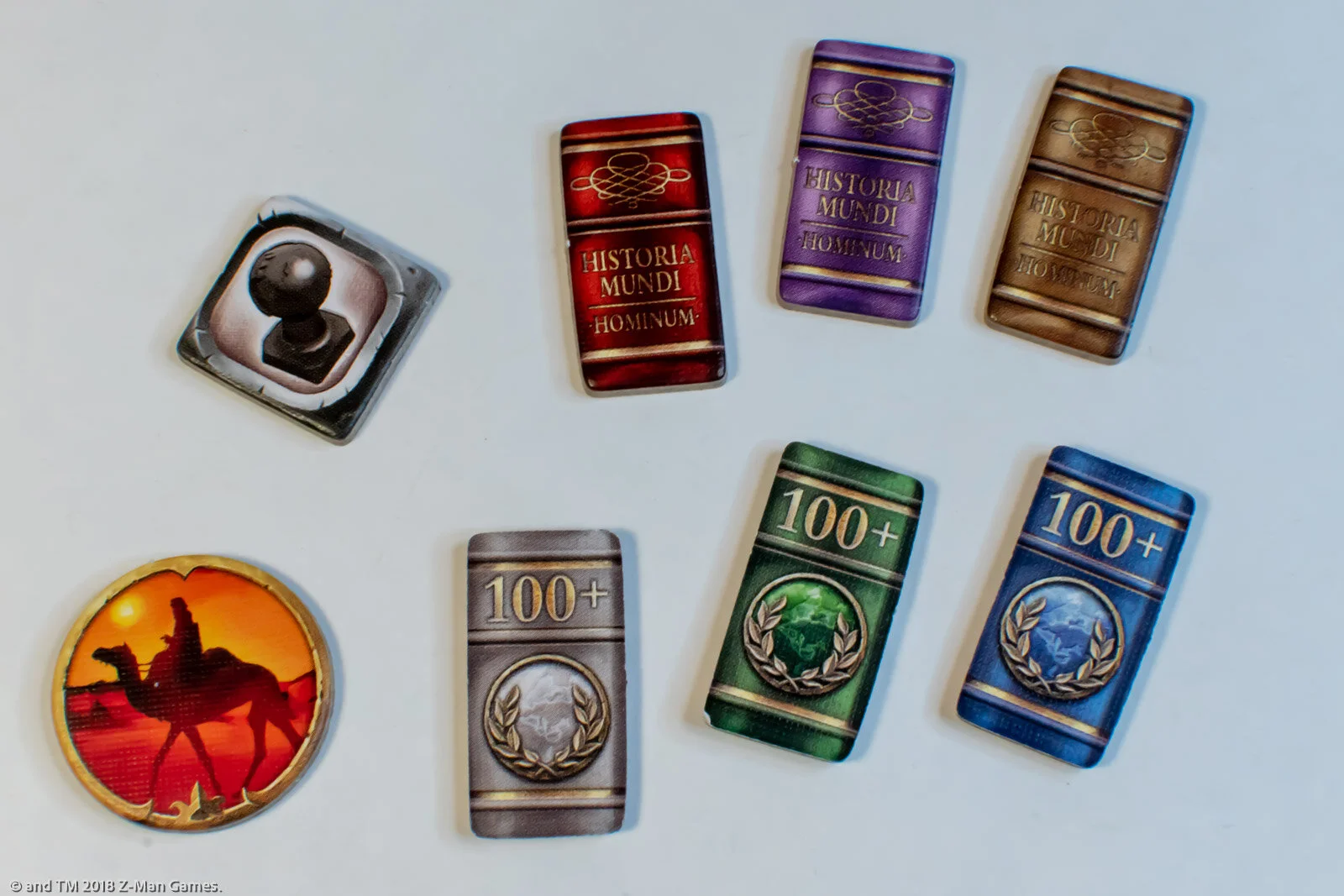 History of the World (Z-Man Edition) punchboard tokens. Featuring all-original artwork by Samuel R. Shimota. Frame Graphic Design on Caravan (camel) token by David Ardila.