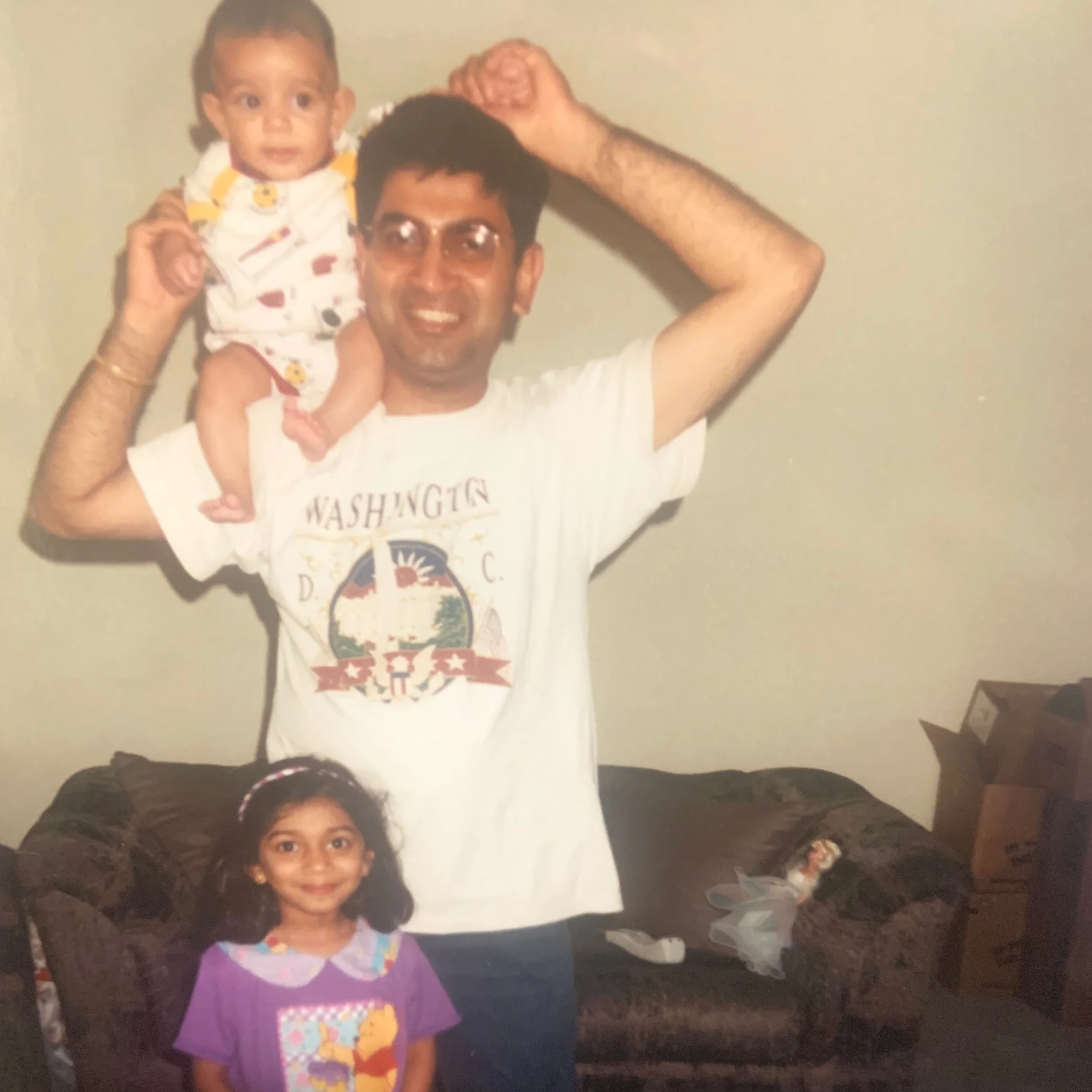 Ashmi with her brother and father