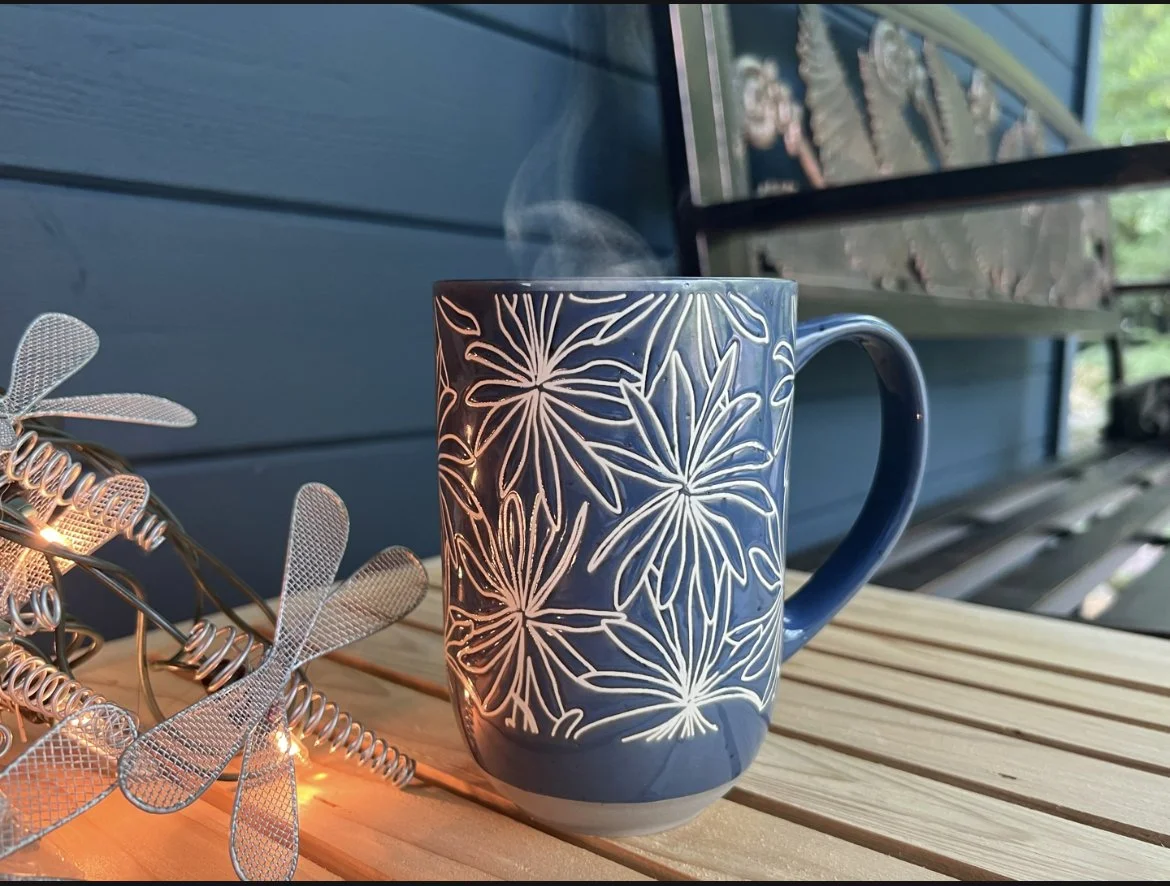 Enjoy a nice cup of coffee on the front porch, or out back!
