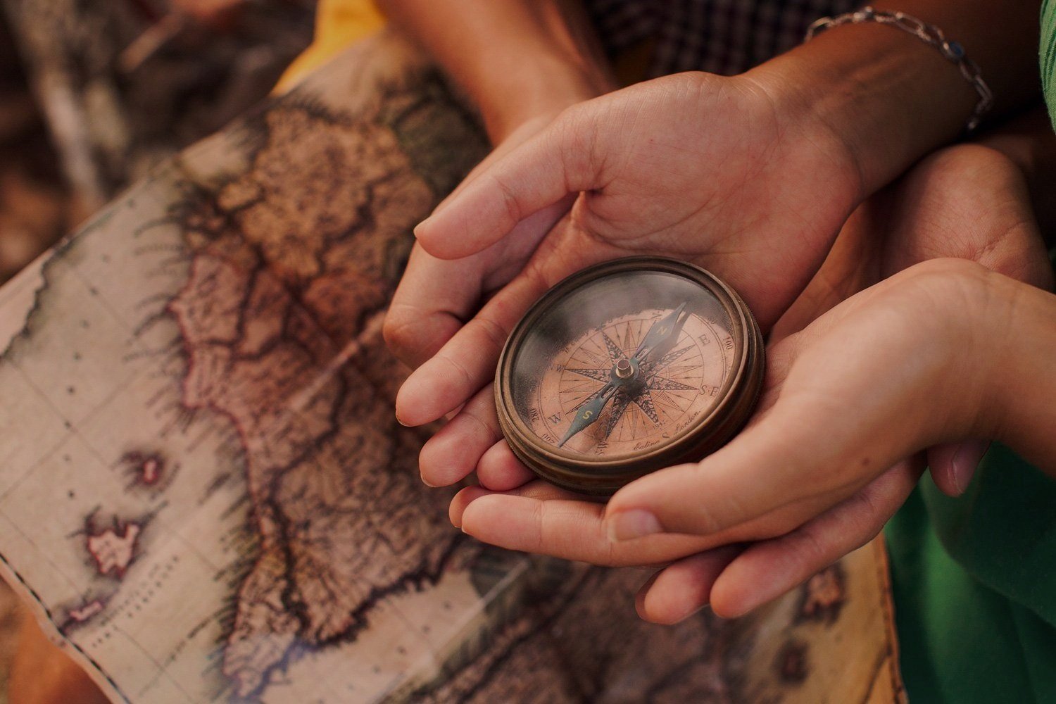 Compass in palm of hand - Human Design Guide