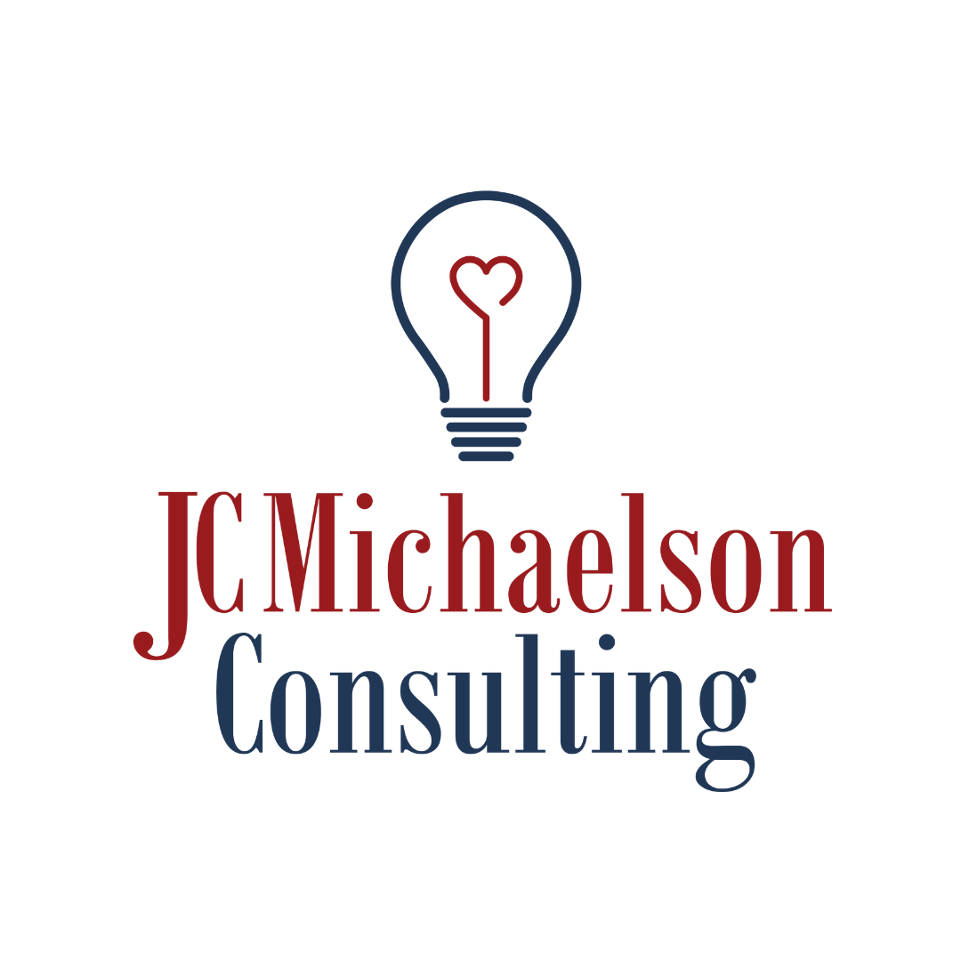 Logo for JC Michaelson Consulting with a lightbulb icon and a heart inside it.