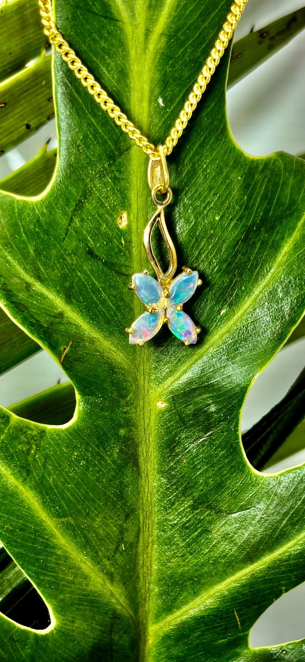 Wings Of Light Gold Opal Pendant.