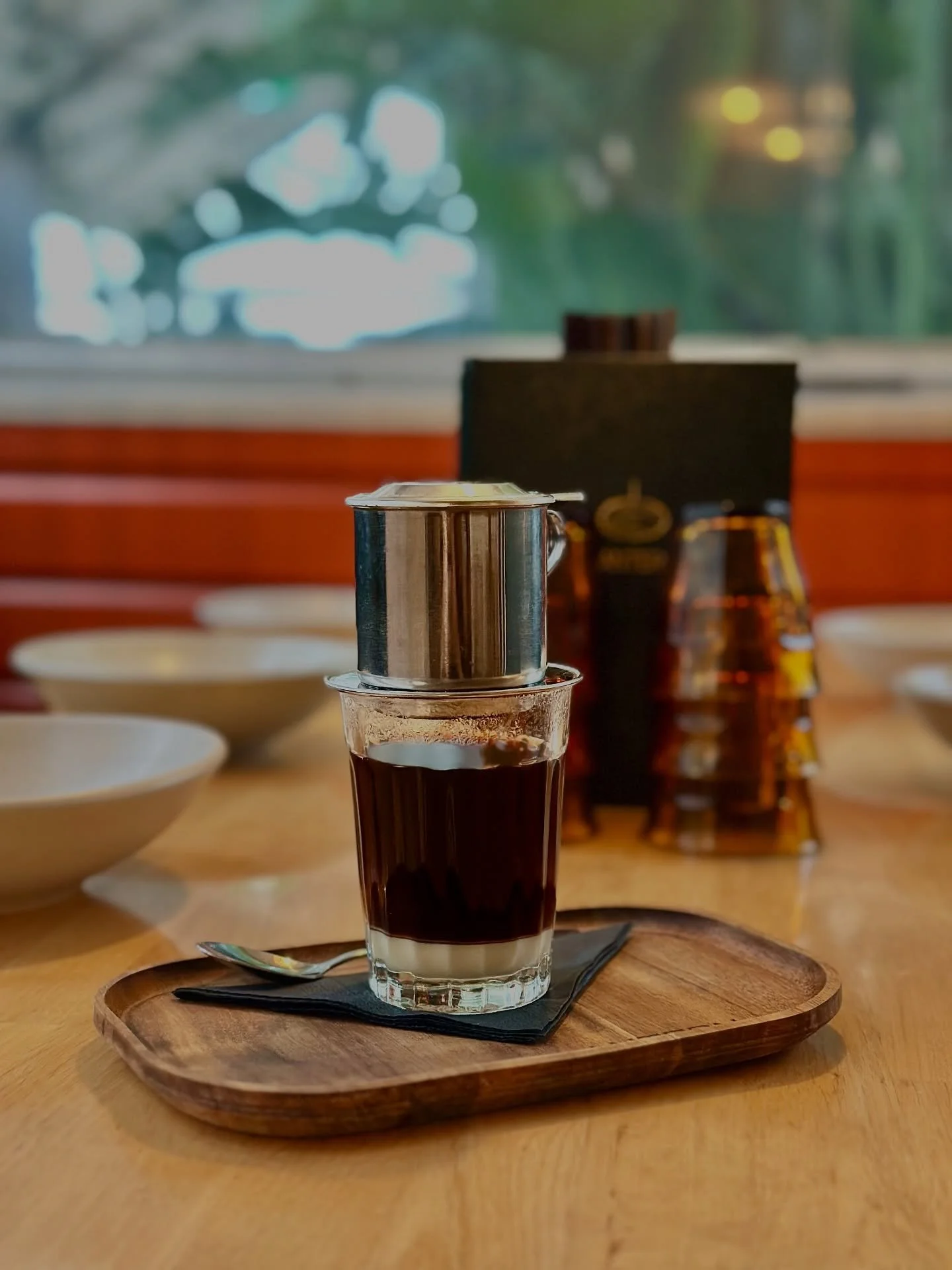 Rain outside, warmth inside.
Escape the drizzle with a warm glass of Vietnamese coffee; bold, sweet, and exactly what a rainy day needs.