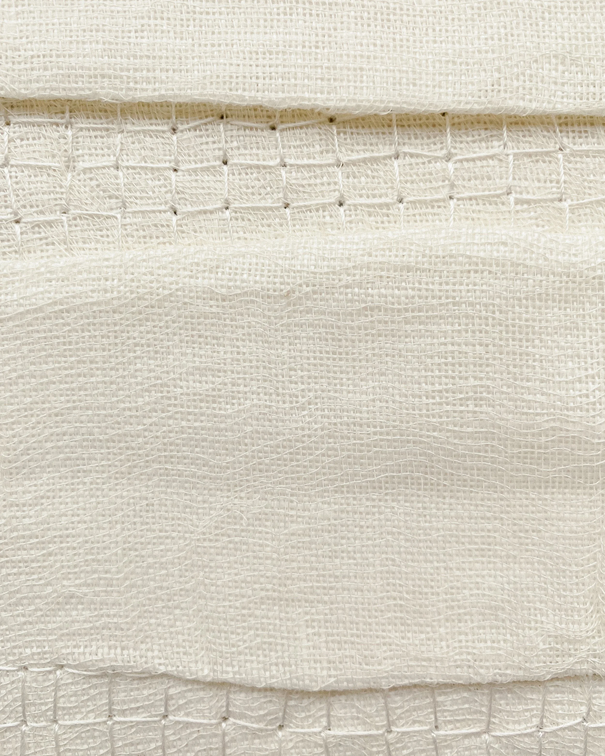 Zoomed-in image of textile wall art