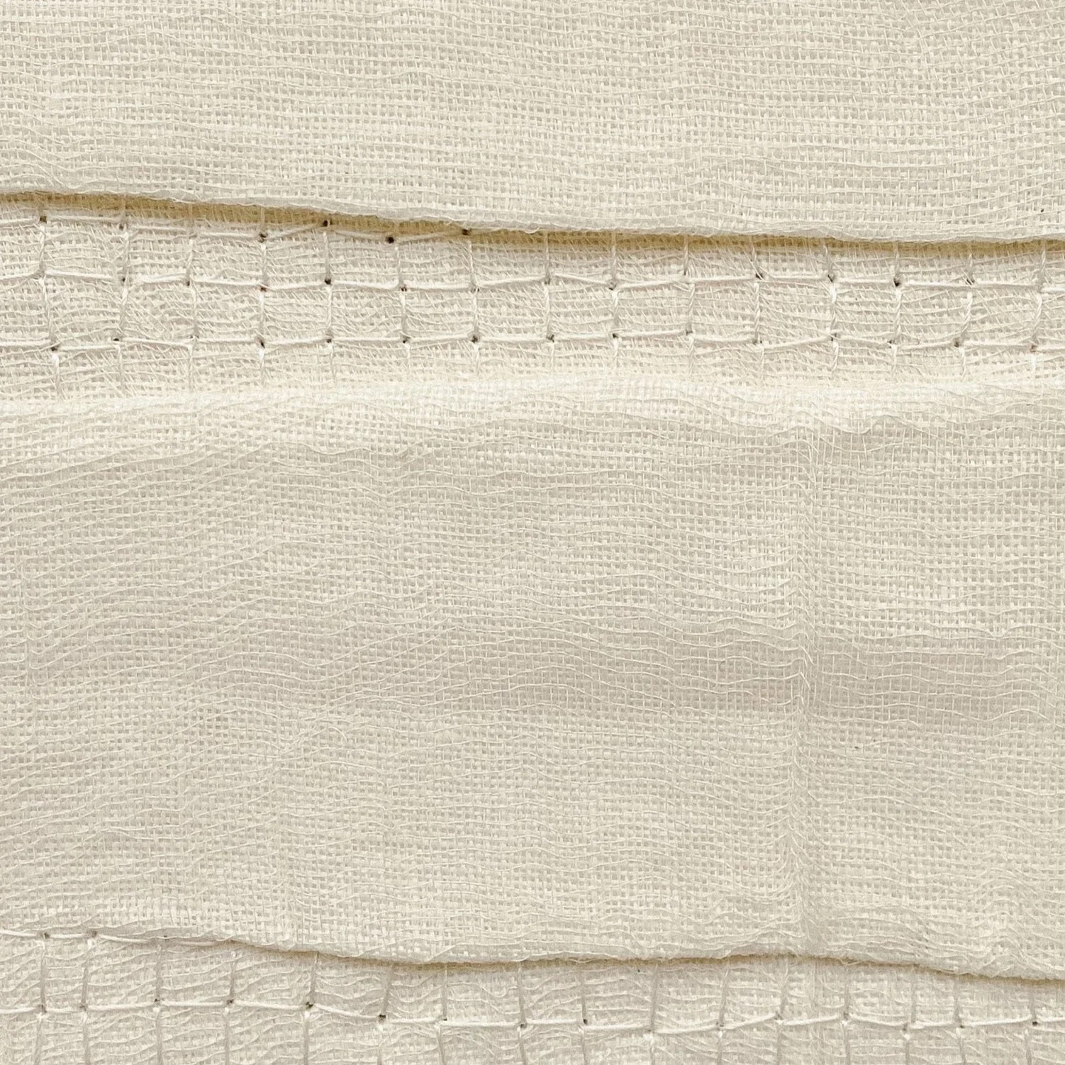 Zoomed in detailed image of minimal textile wall art unframed, dimensions are 15 by 15 centimeters.