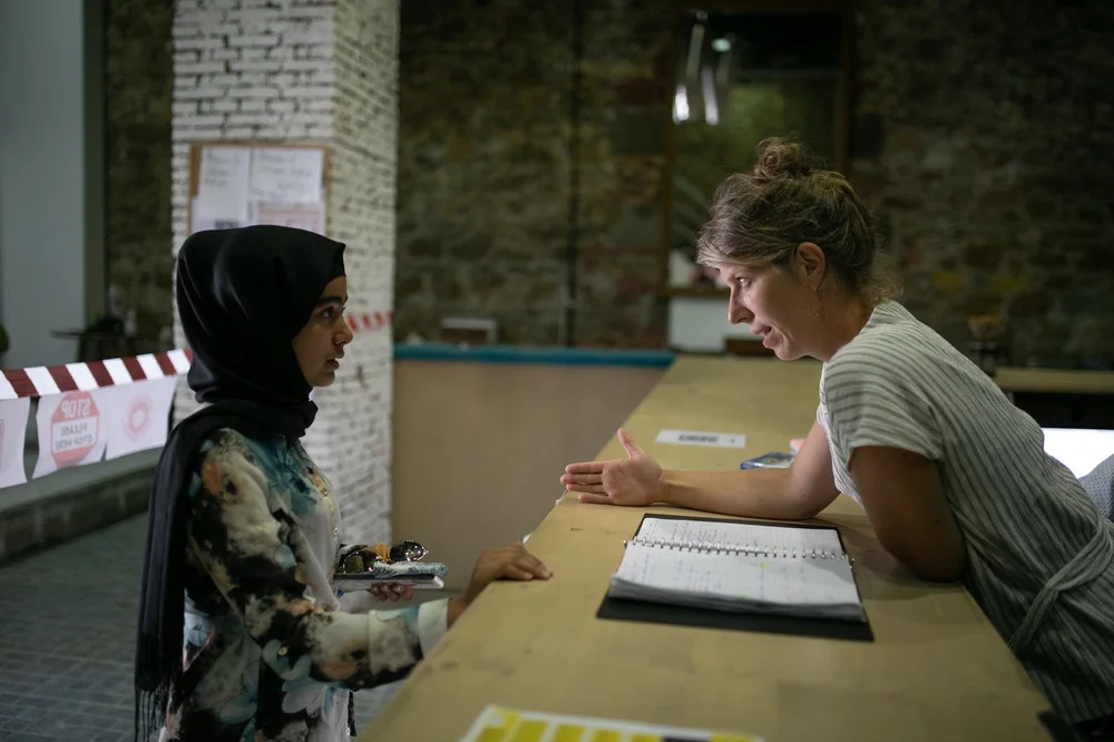 Alice explaining to Anis.jpeg