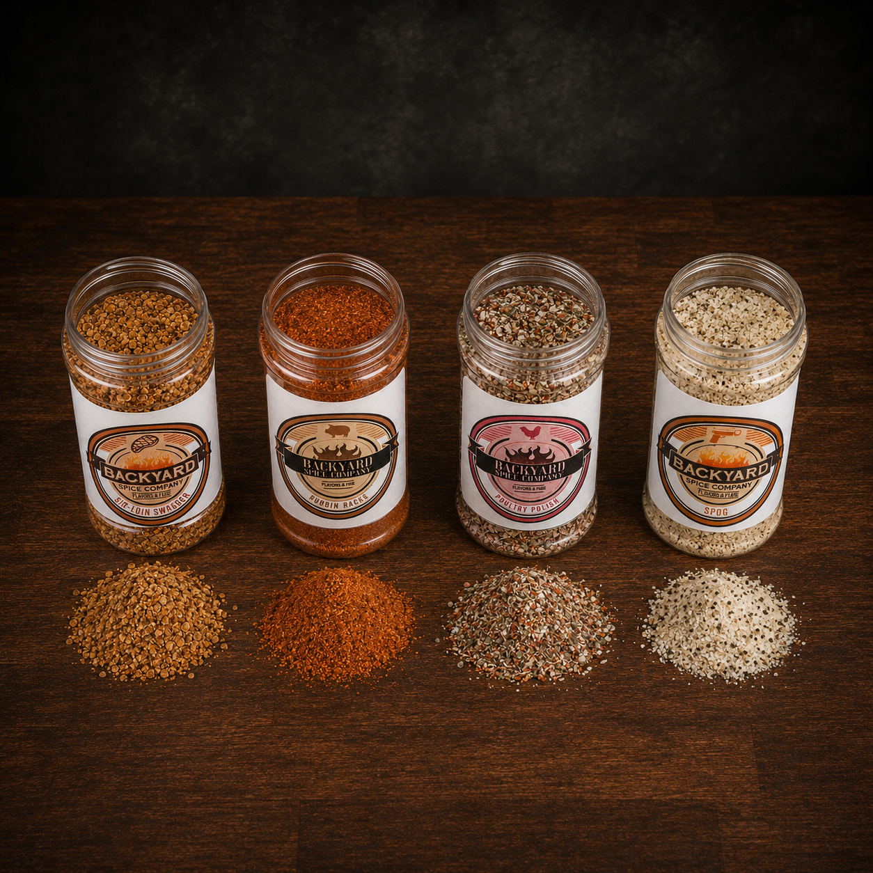open jars and seasoning piles from backyard Bundle grill seasoning four-pack.png