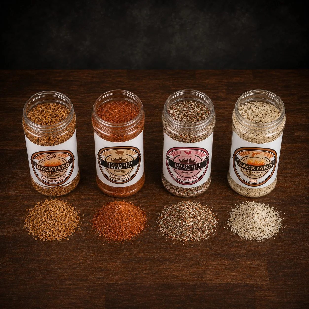 Open jars and seasoning piles from the Backyard Bundle grill seasoning four-pack