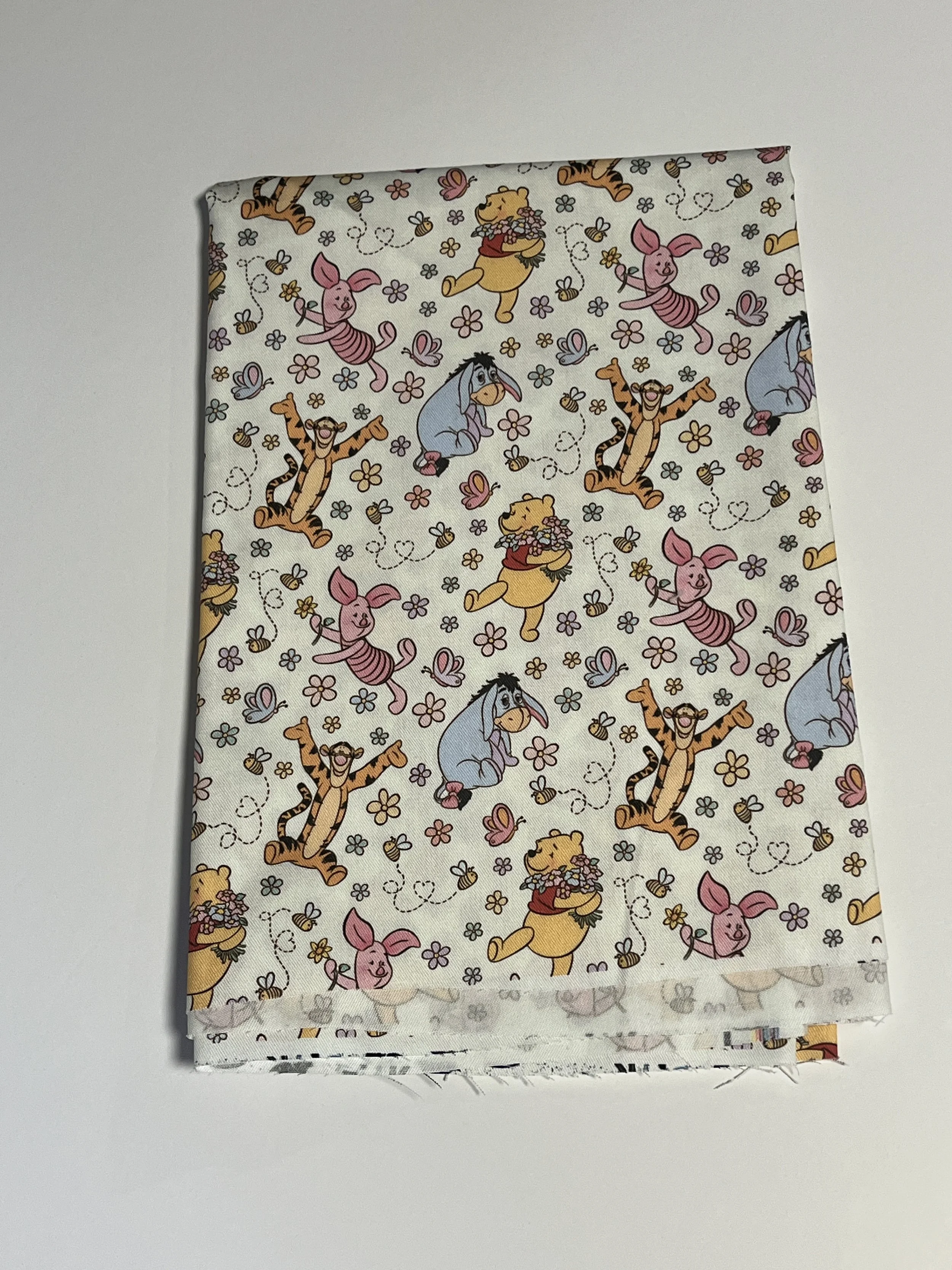 Floral Pooh MD Scale cotton twill