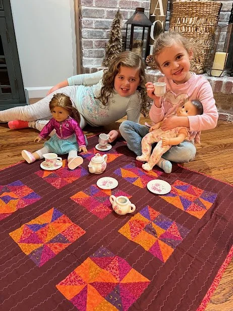 Tea time on the quilt.JPG