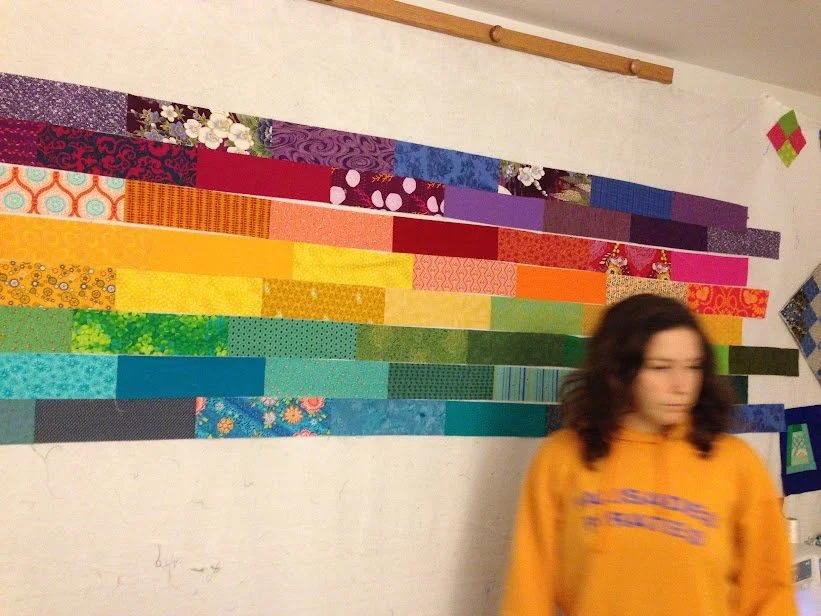 kelly dan rainbow quilt.JPG