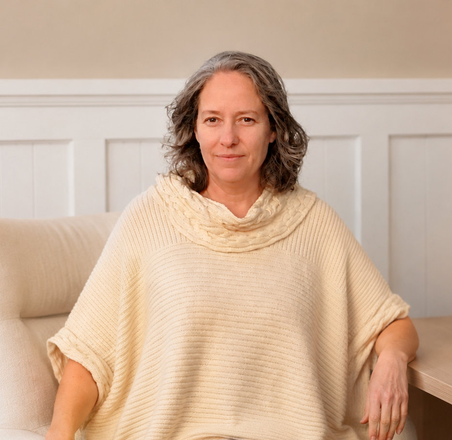 Dr. Burke ND in office at desk - Licensed Naturopathic Doctor and Women's Health Professional 