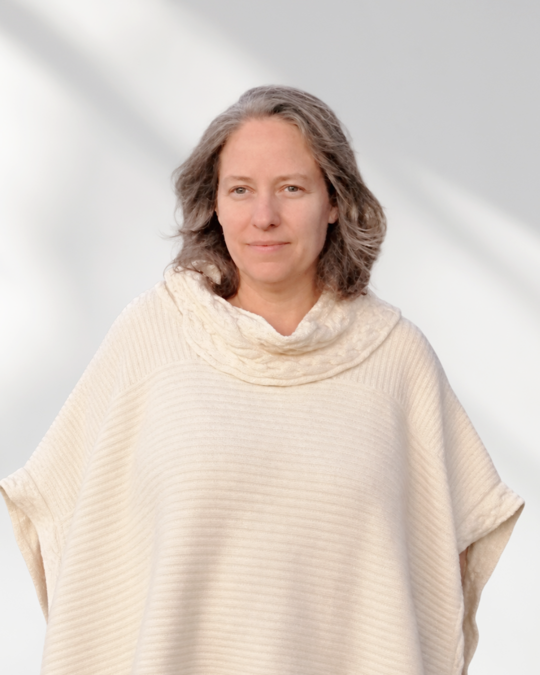 Dr. Burke ND in office at desk - Licensed Naturopathic Doctor and Women's Health Professional