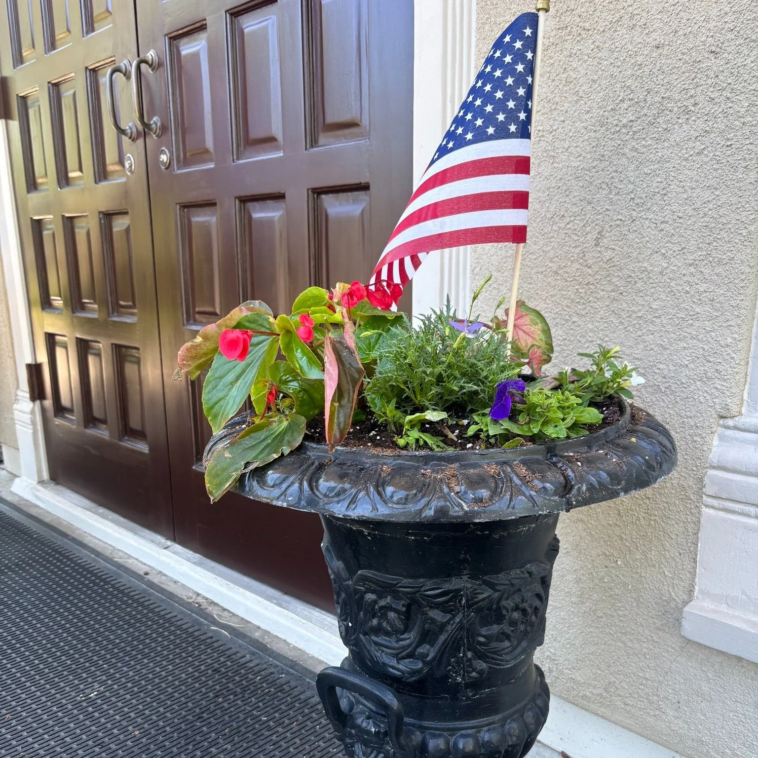 The 2026 Ansel B. Cook Home summer open house season starts one week from today! The front doors have been refinished and the Town and Country Garden Club of Libertyville have filled the urns with summer flowers. Come see the inside! The home is open