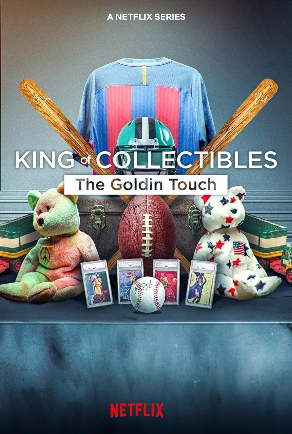 Poster for Netflix series "King of Collectibles: The Goldin Touch" featuring sports memorabilia including a signed baseball, an American football, signed tennis cards, and two plush teddy bears with patriotic themes, set against sports equipment and a vintage suitcase.