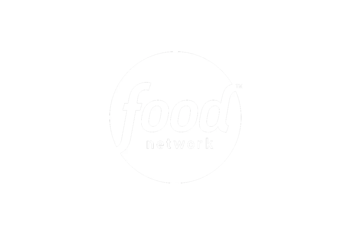 Black and white logo of the Food Network, featuring the word "food" inside a white circle with the word "network" underneath.