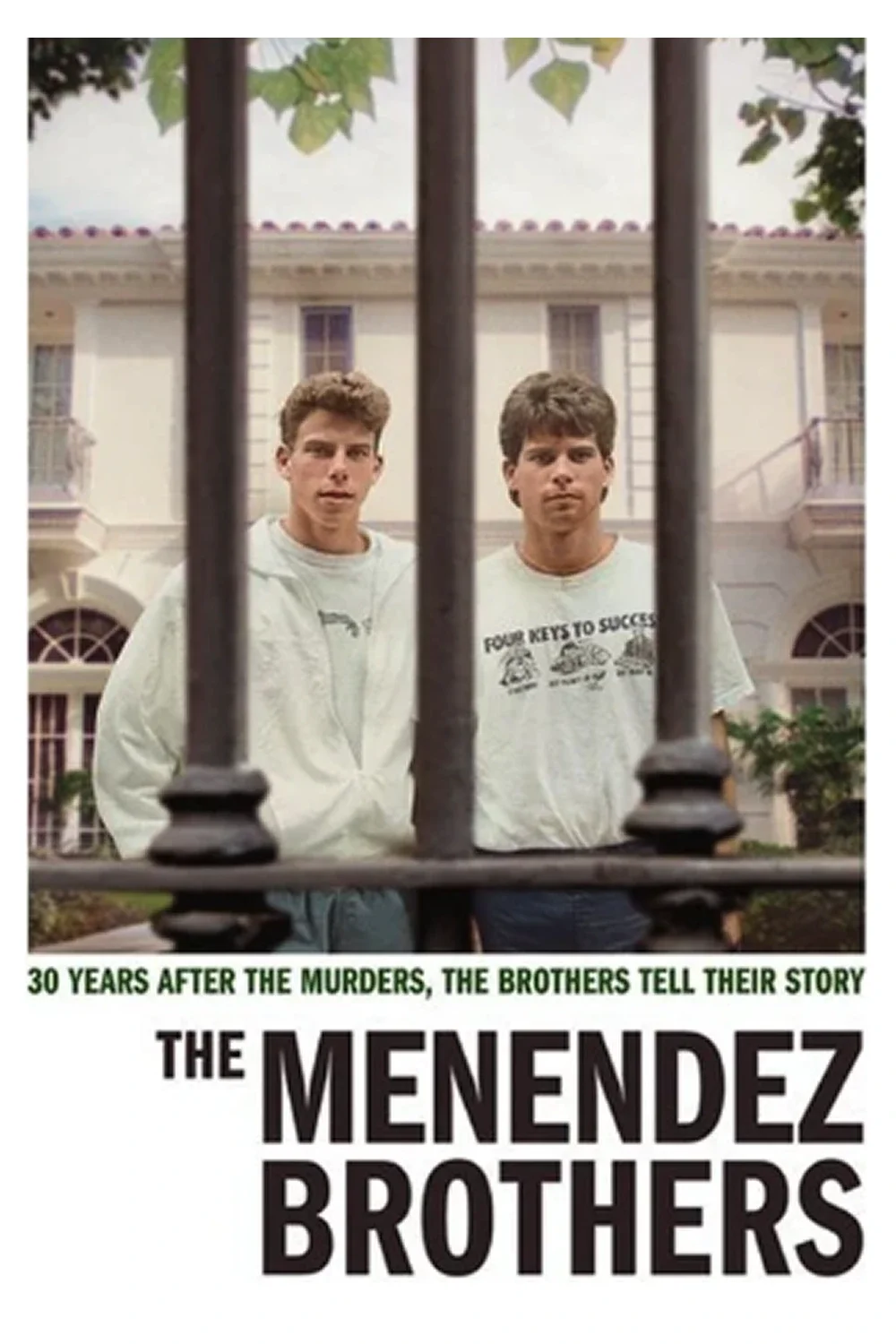 A poster featuring the Menendez Brothers, two young men standing outside a building, seen through black metal bars. The poster includes the text, "30 YEARS AFTER THE MURDERS, THE BROTHERS TELL THEIR STORY" and the title "THE MENENDEZ BROTHERS" in bold black letters.