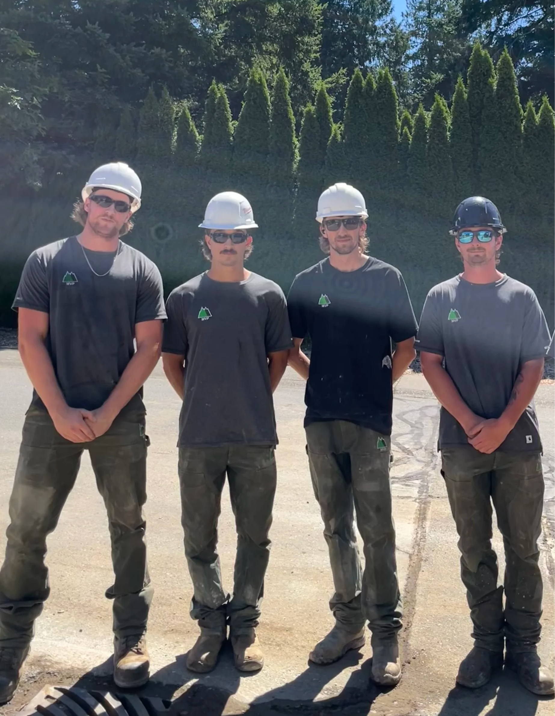Mountain Valley Paving crew together on a job site