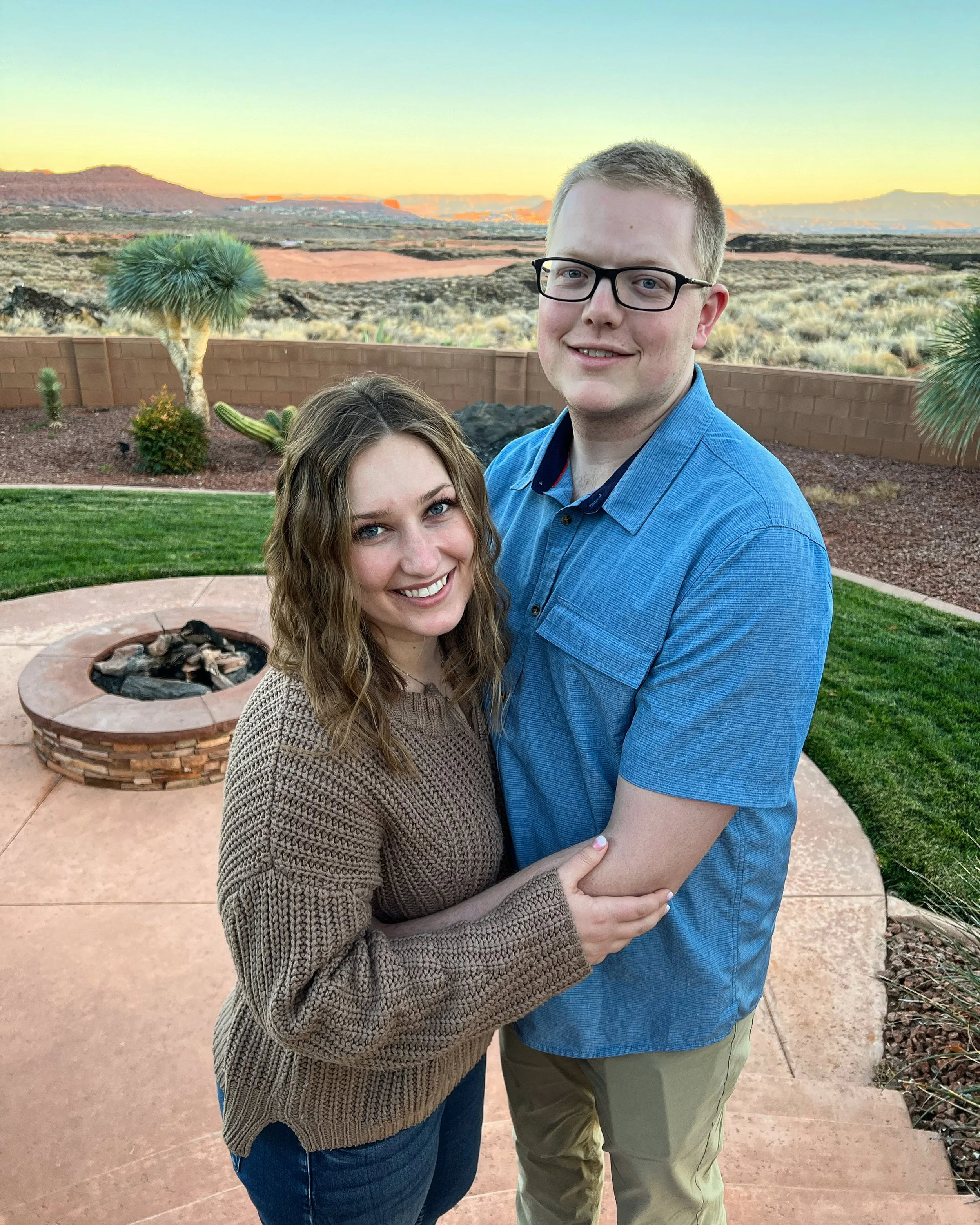 Typical picture of Jessica wearing a sweater because she's cold and Brett wearing short sleeves because he is too hot.