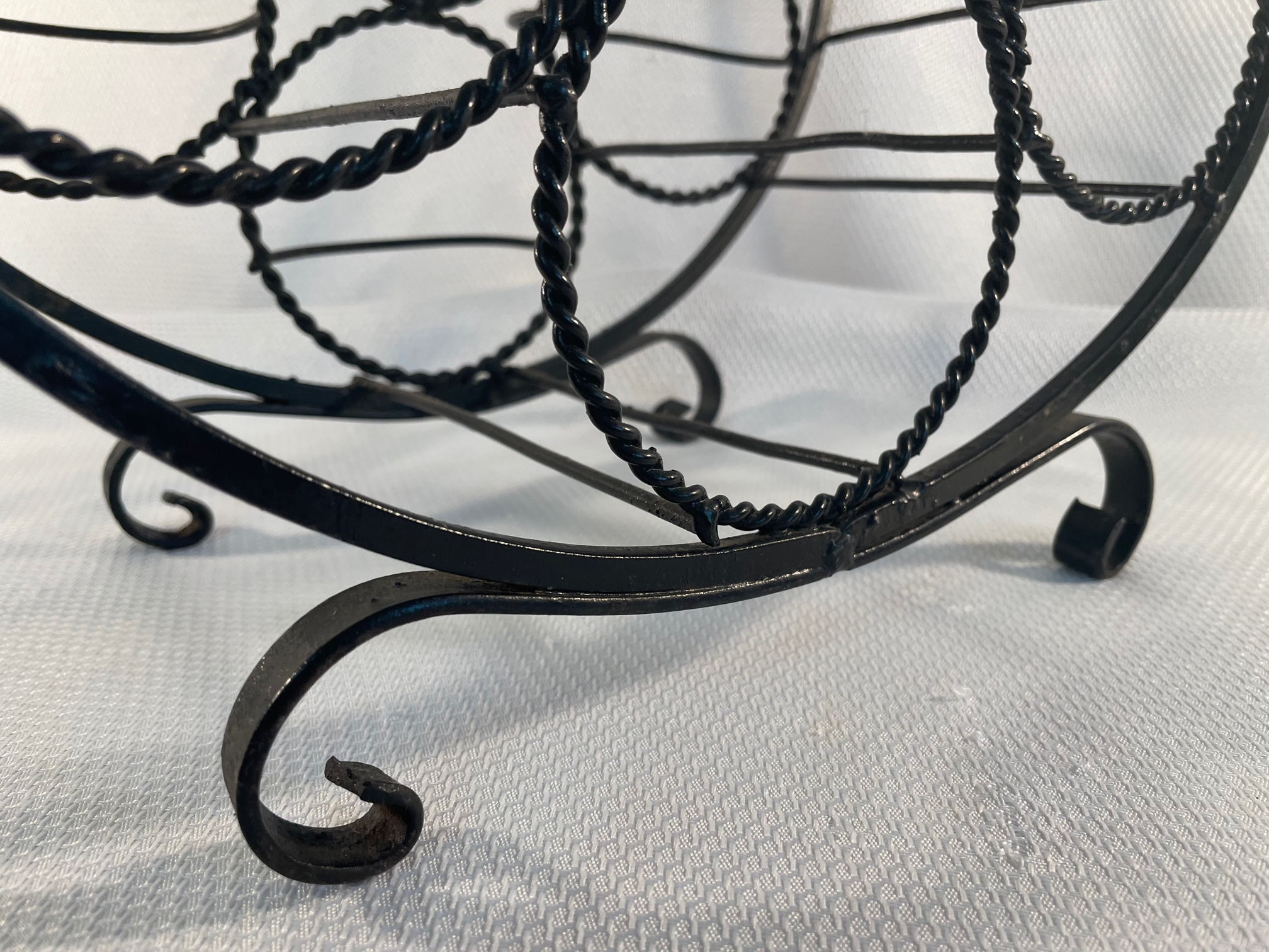 vintage-black-twisted-metal-wrought-iron-wine-rack-3890.png