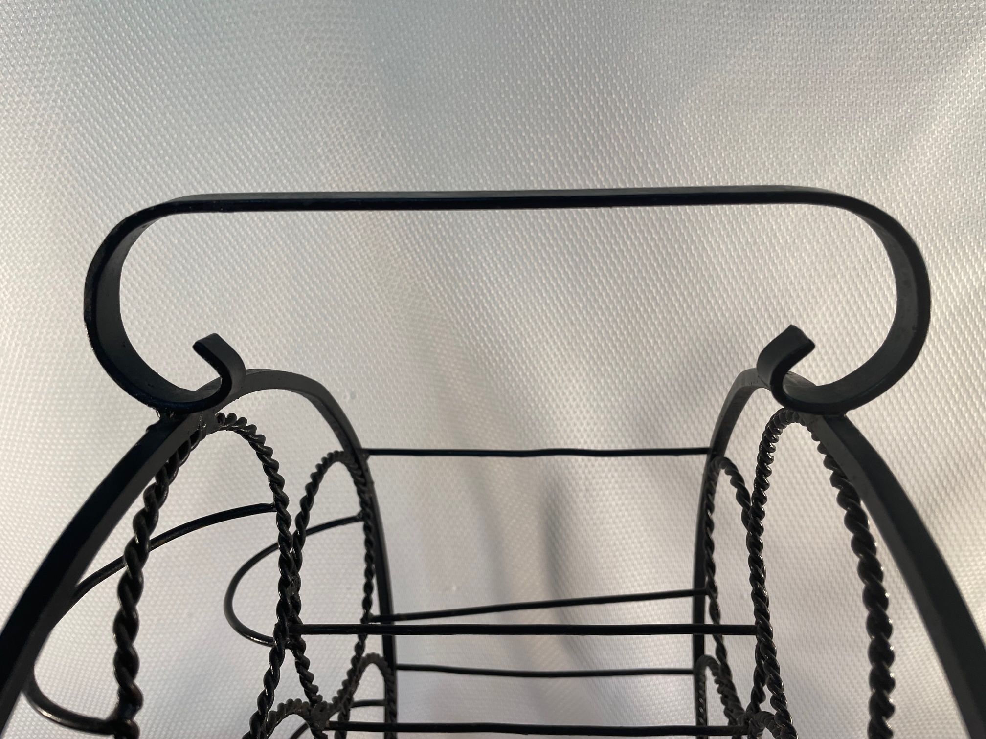 vintage-black-twisted-metal-wrought-iron-wine-rack-5794.png