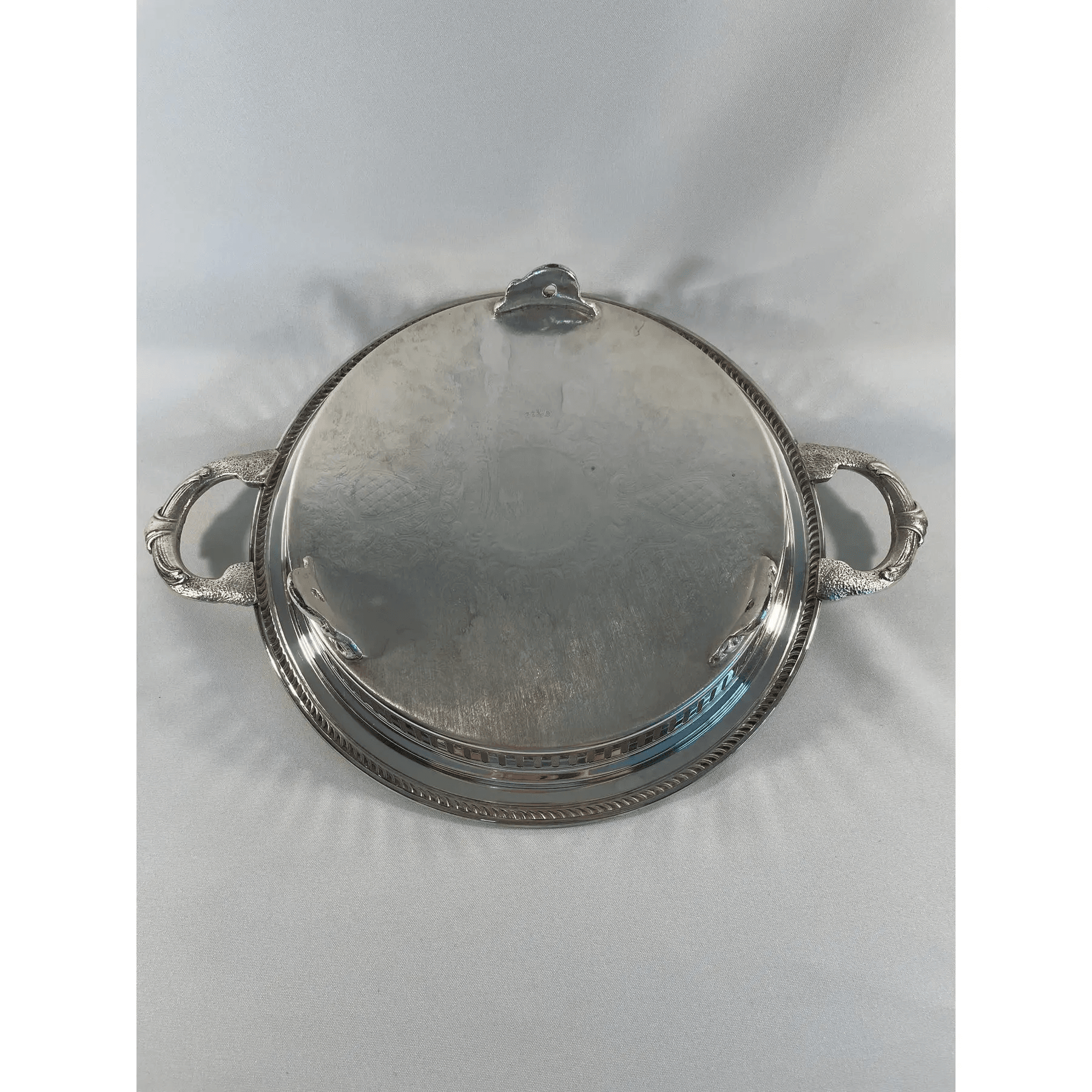 mid-20th-century-round-silverplated-footed-gallery-serving-tray-8793.png