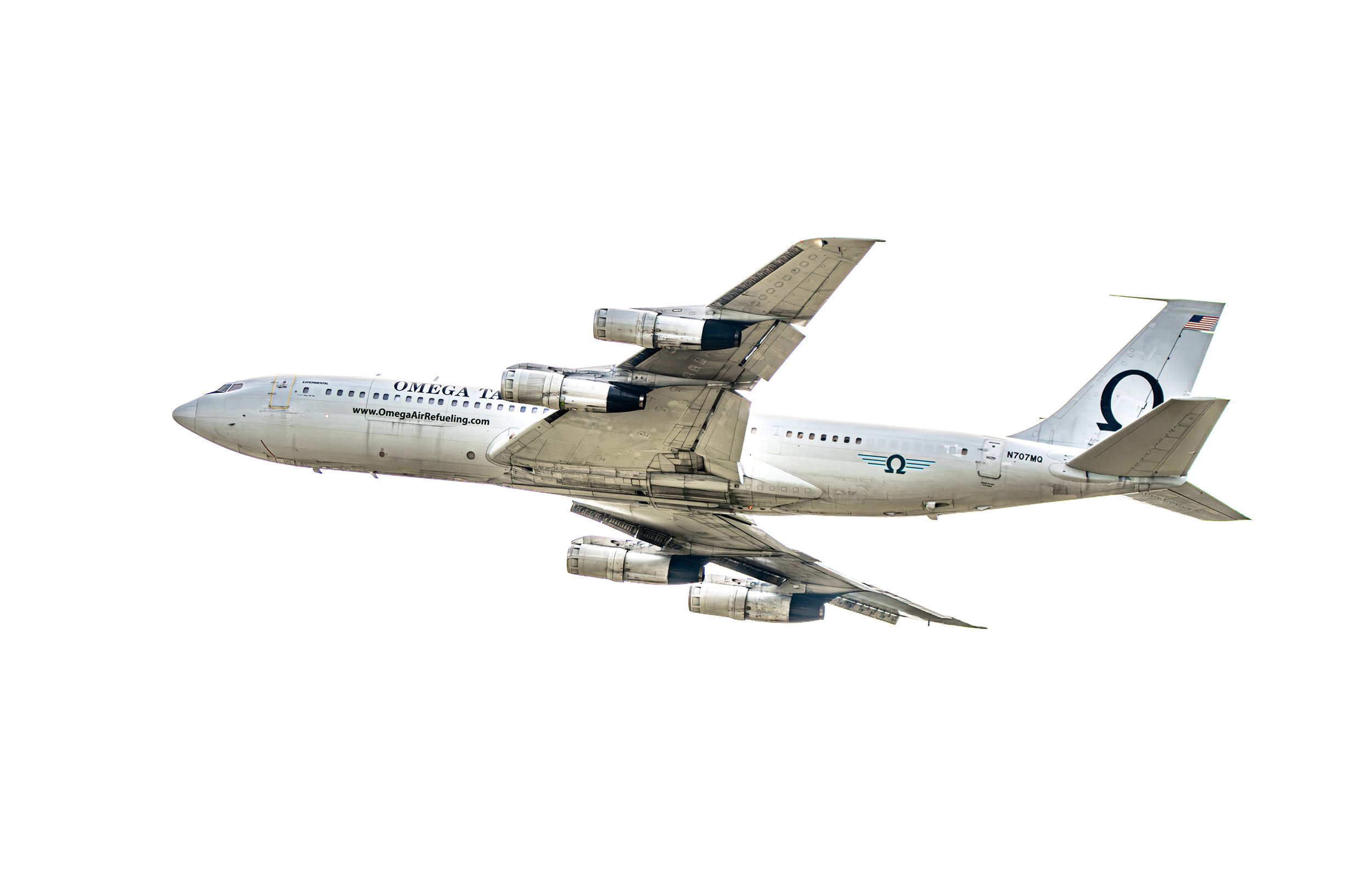 A commercial jet airplane flying in the sky with white background