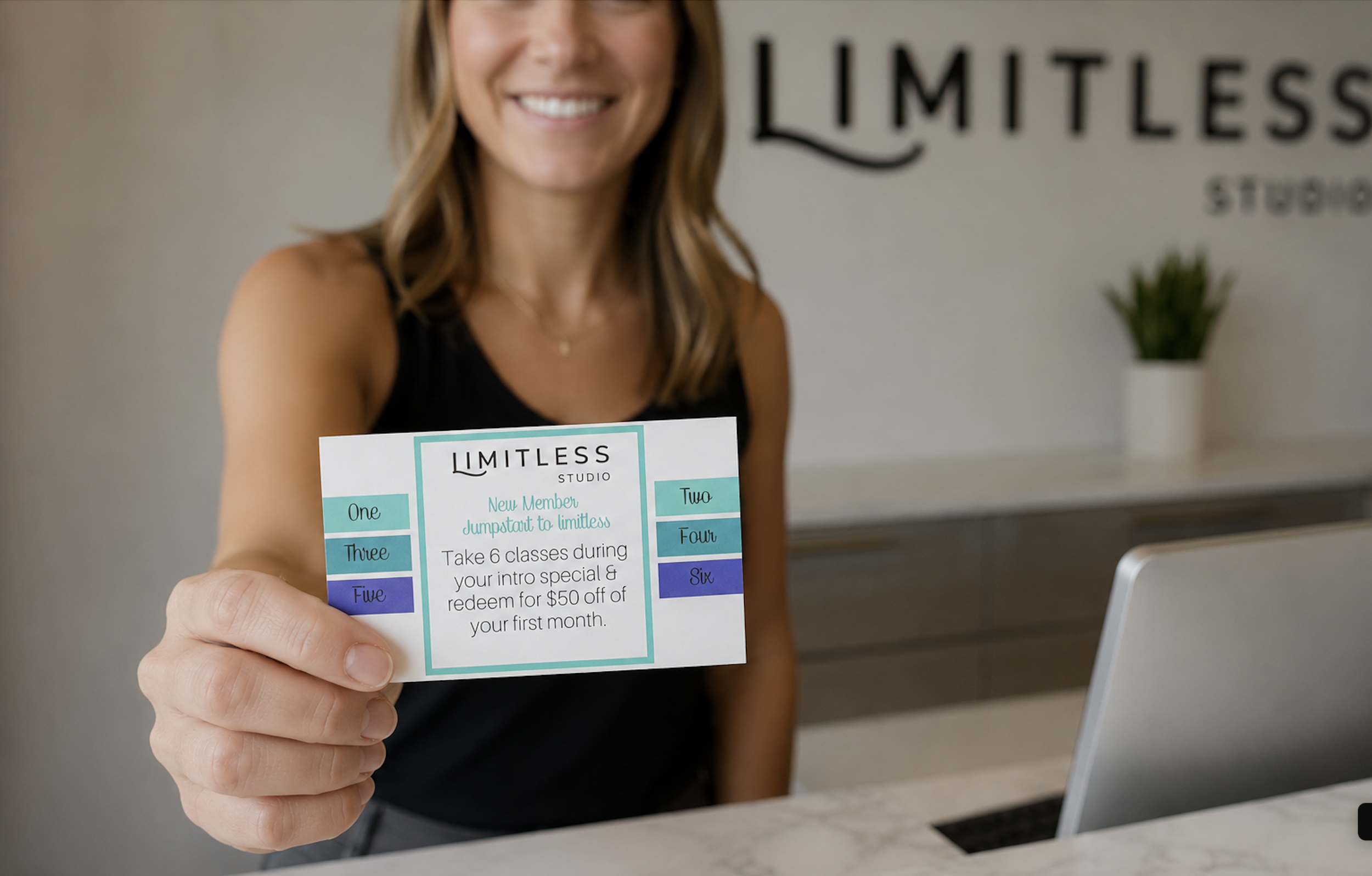 studio owner holding a punchcard