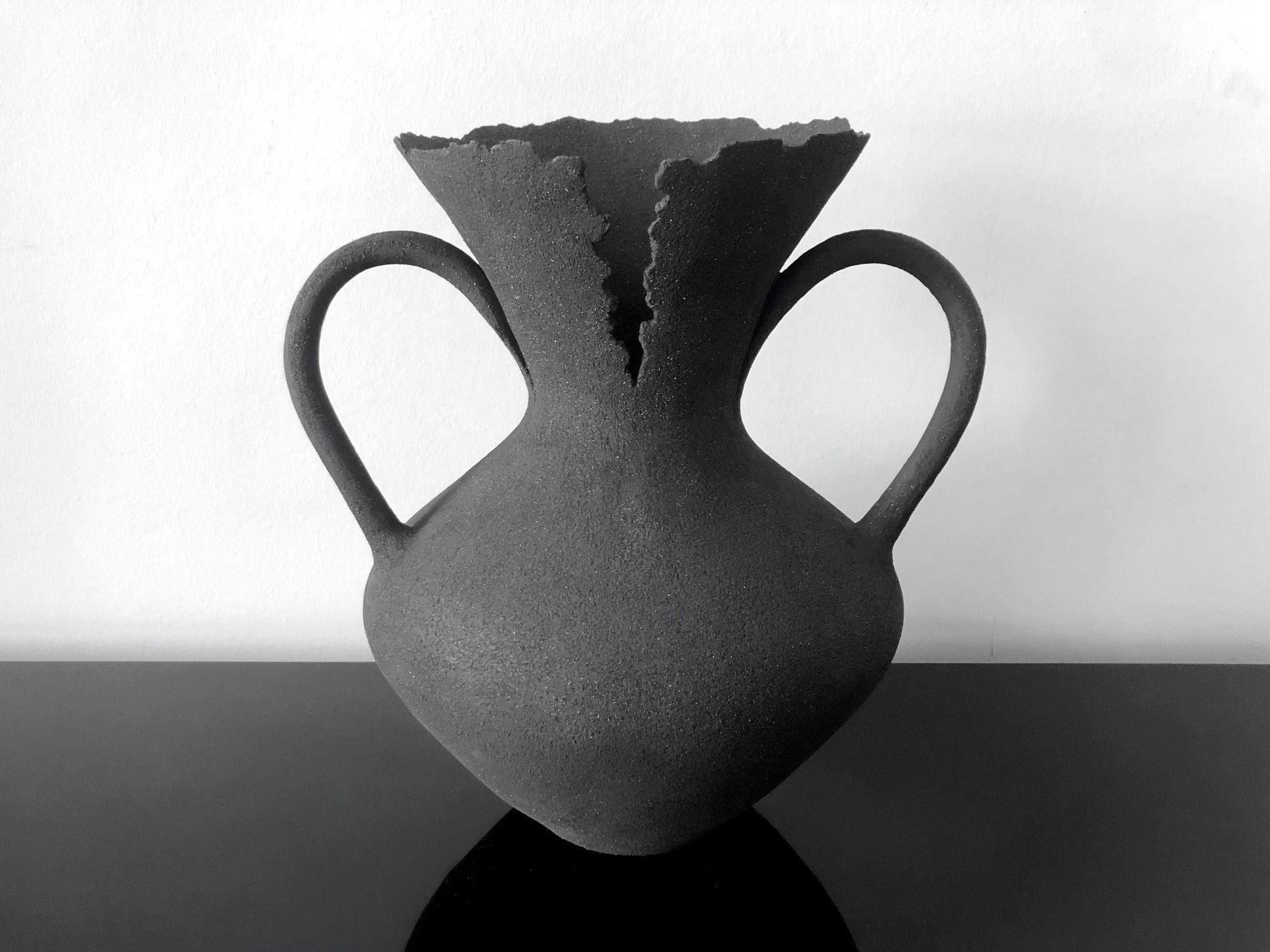 Emily Buck, Celaeno, 2023, Hand-built textured black stoneware vessel, 37 x 34 cm