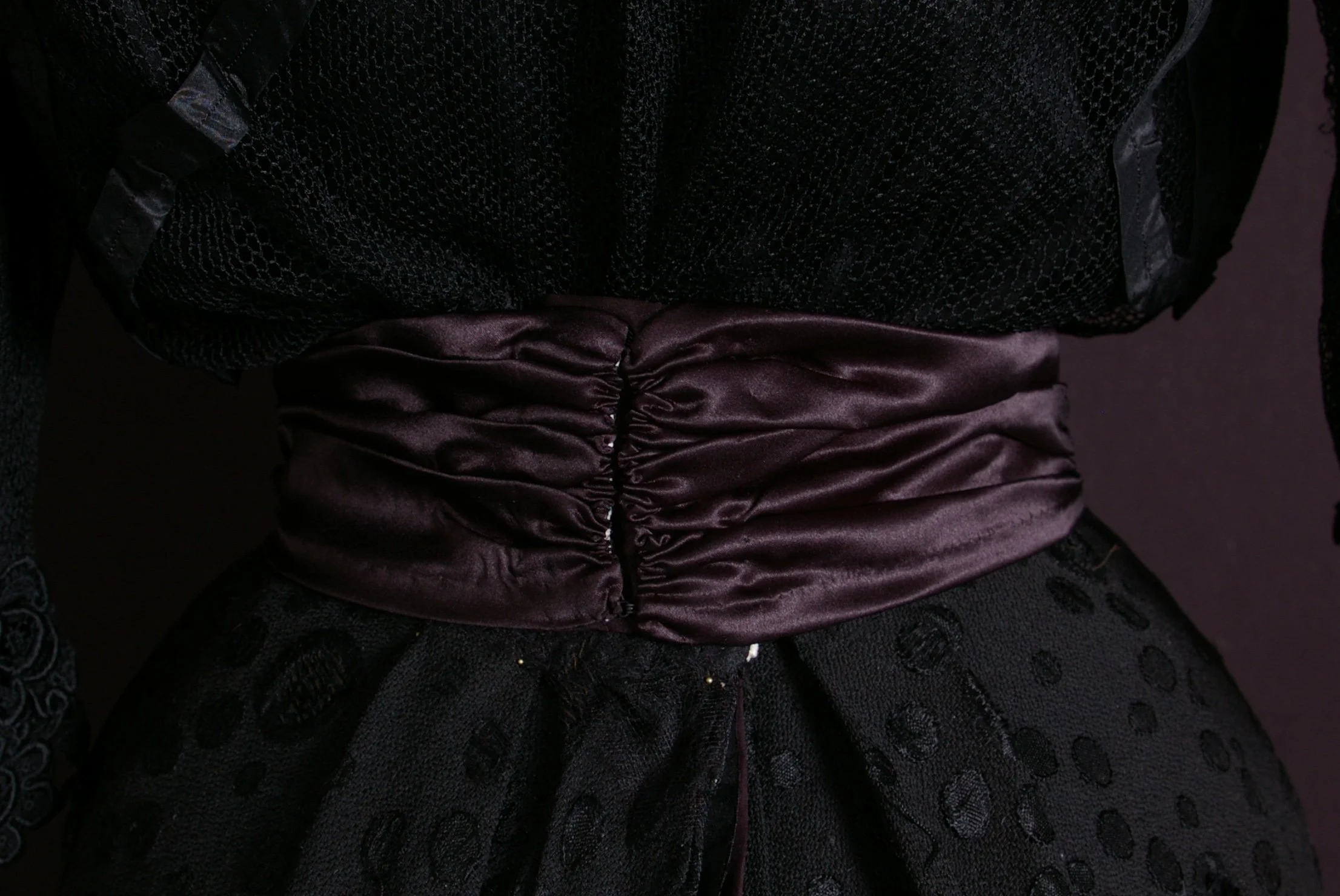 The final belt closed with hook and eyes at the back.