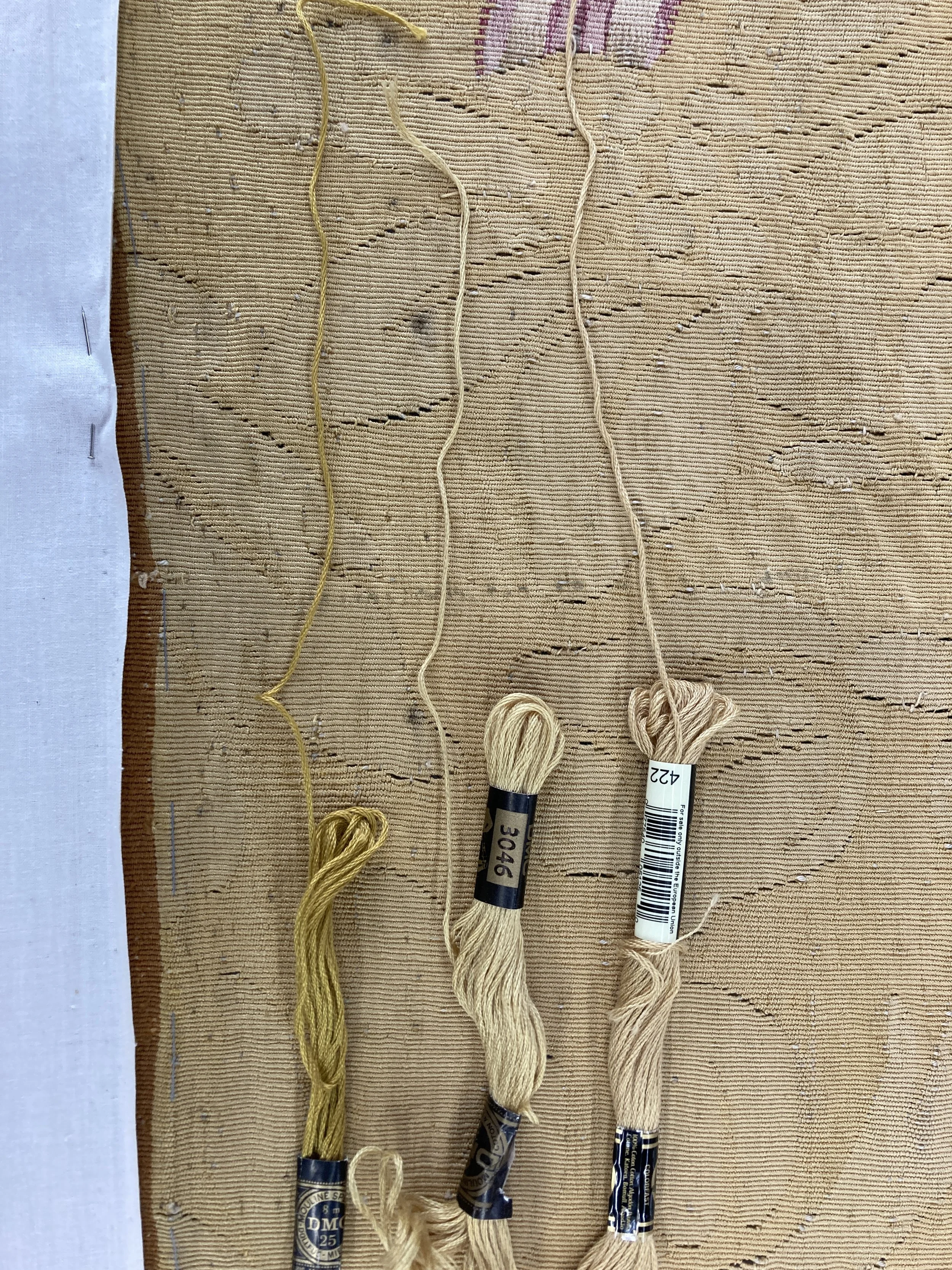 Testing colors of DMC thread for the background. Photo Credit: Margaret O'Neil.