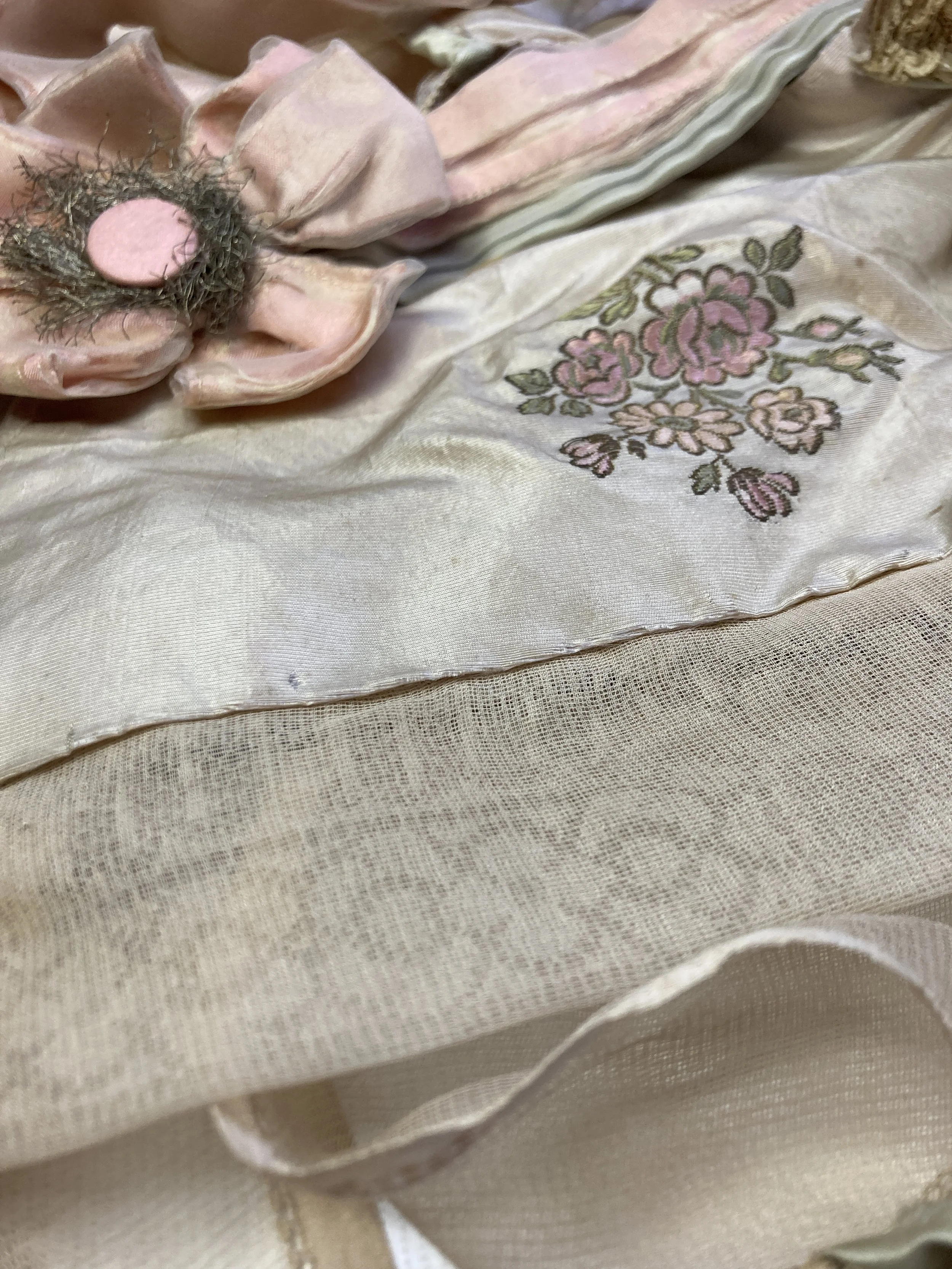 Before Treatment- Shattering silk along fold on top back bodice.  Photo Credit: Margaret O'Neil.