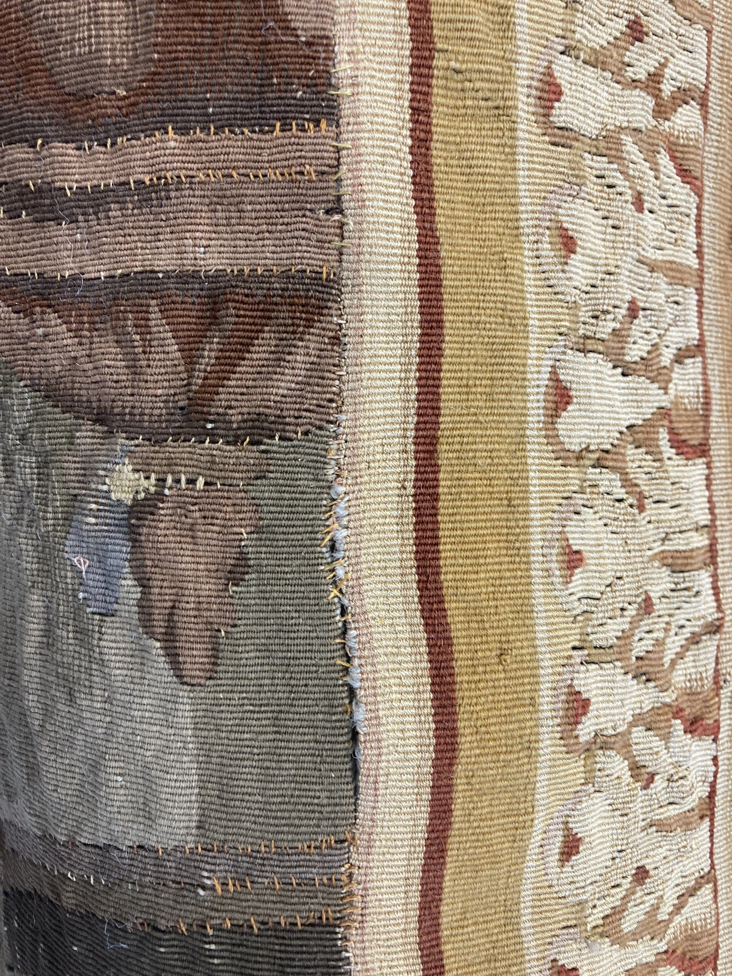 Before treatment, breaks in long vertical seams. Photo Credit: Margaret O'Neil.