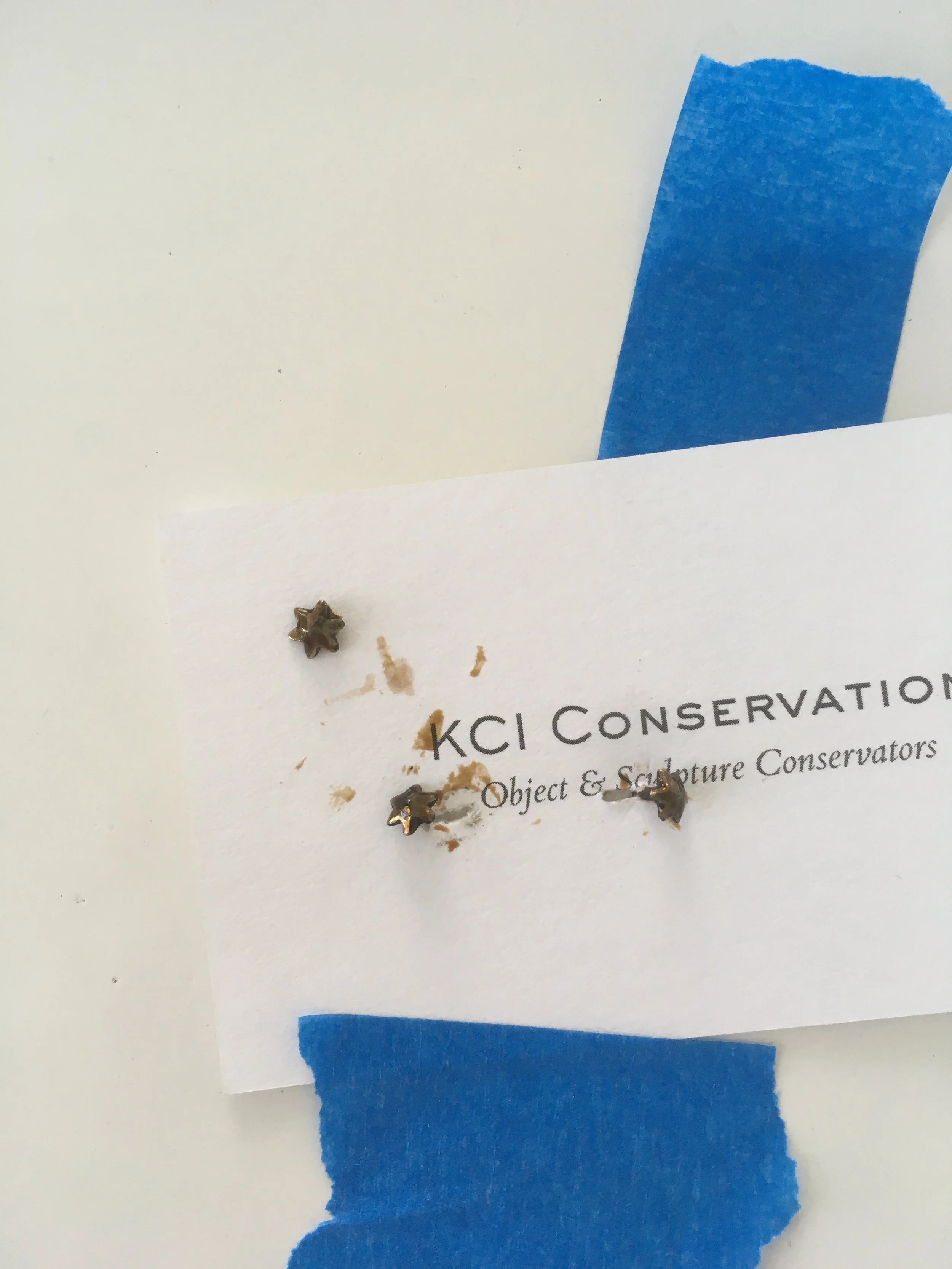 Cut steel stars were harvested from antique buttons (thank you MSBS members!) and covered with shellac.