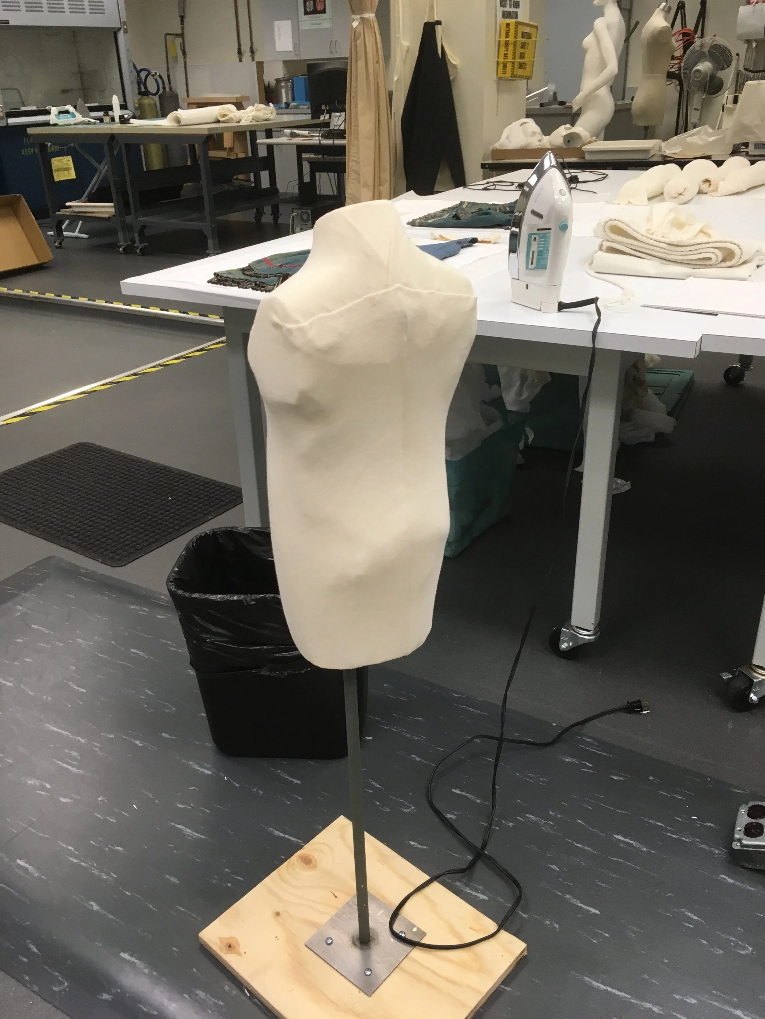 We carved it down slightly, lightly padded it with polyester batting, and covered it with stockinette.