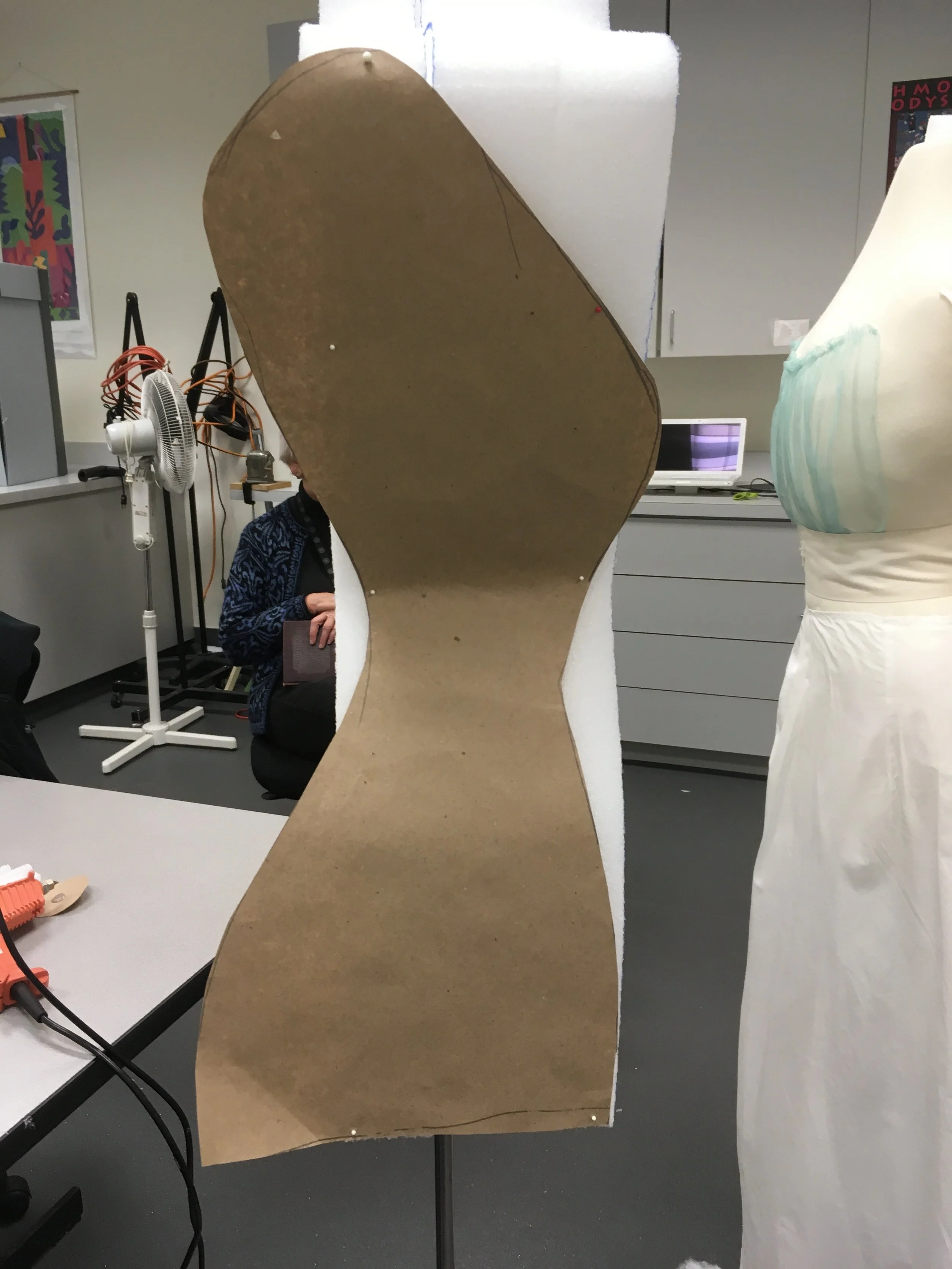 A mock up of the side view was placed on the Ethafoam block to begin the preliminary carving.