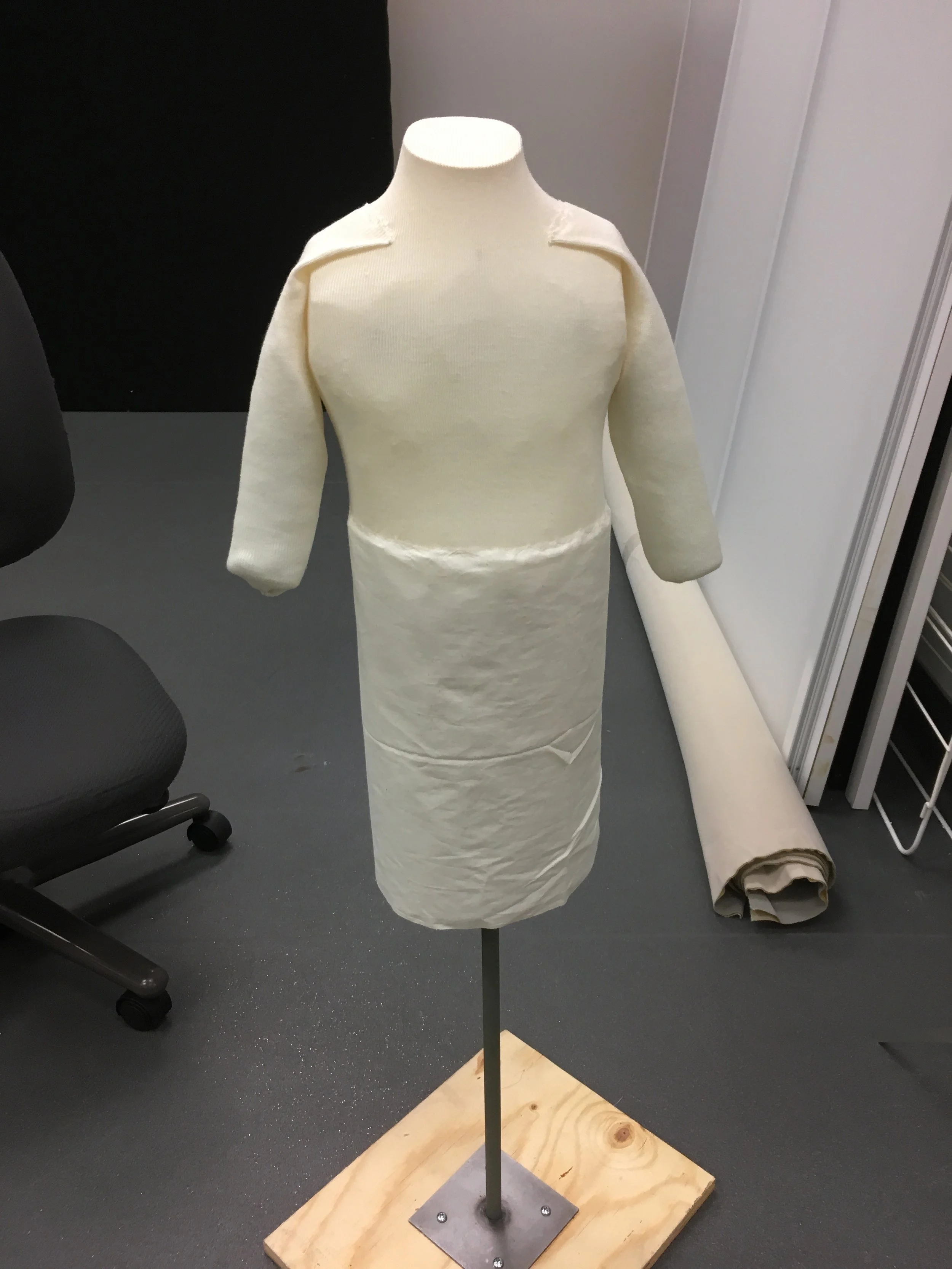 3/4 arms were added and buckram was put around the bottom of the torso to hold the skirt out.